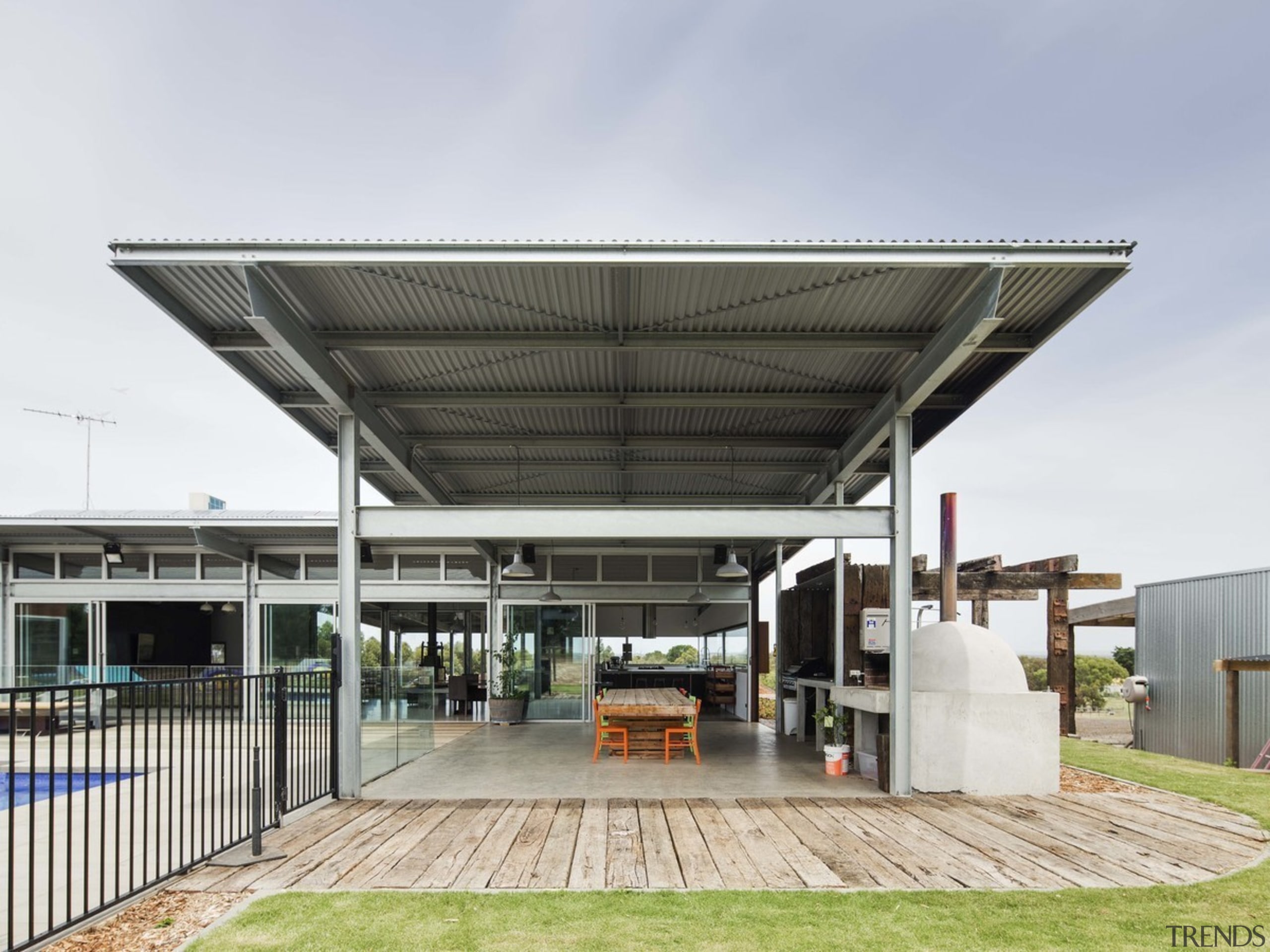 This large awning comes right out over the canopy, roof, shed, white