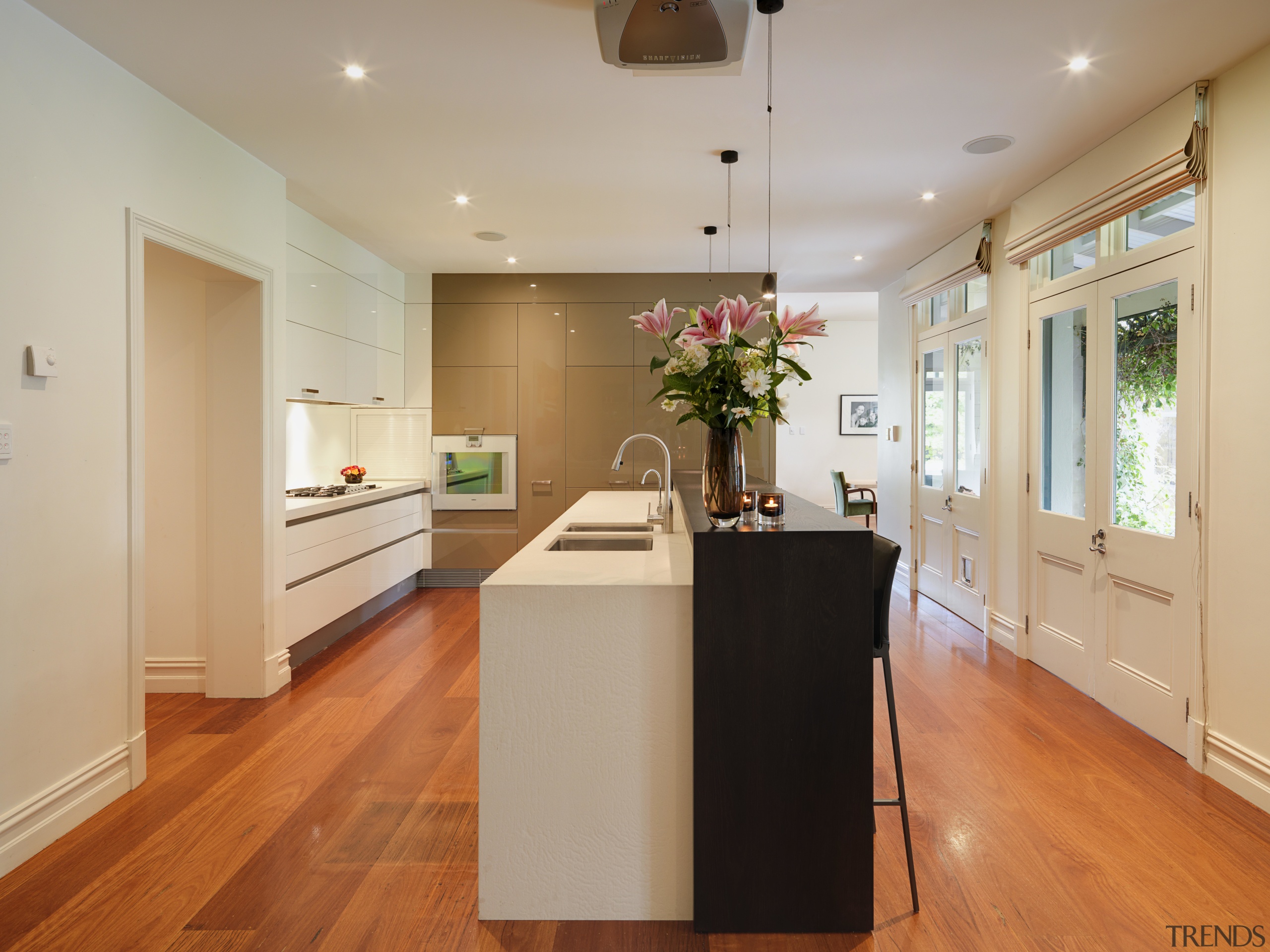 Warm colours featured in this traditional kitchen - ceiling, floor, flooring, hardwood, home, interior design, kitchen, laminate flooring, property, real estate, room, wood, wood flooring, gray, orange