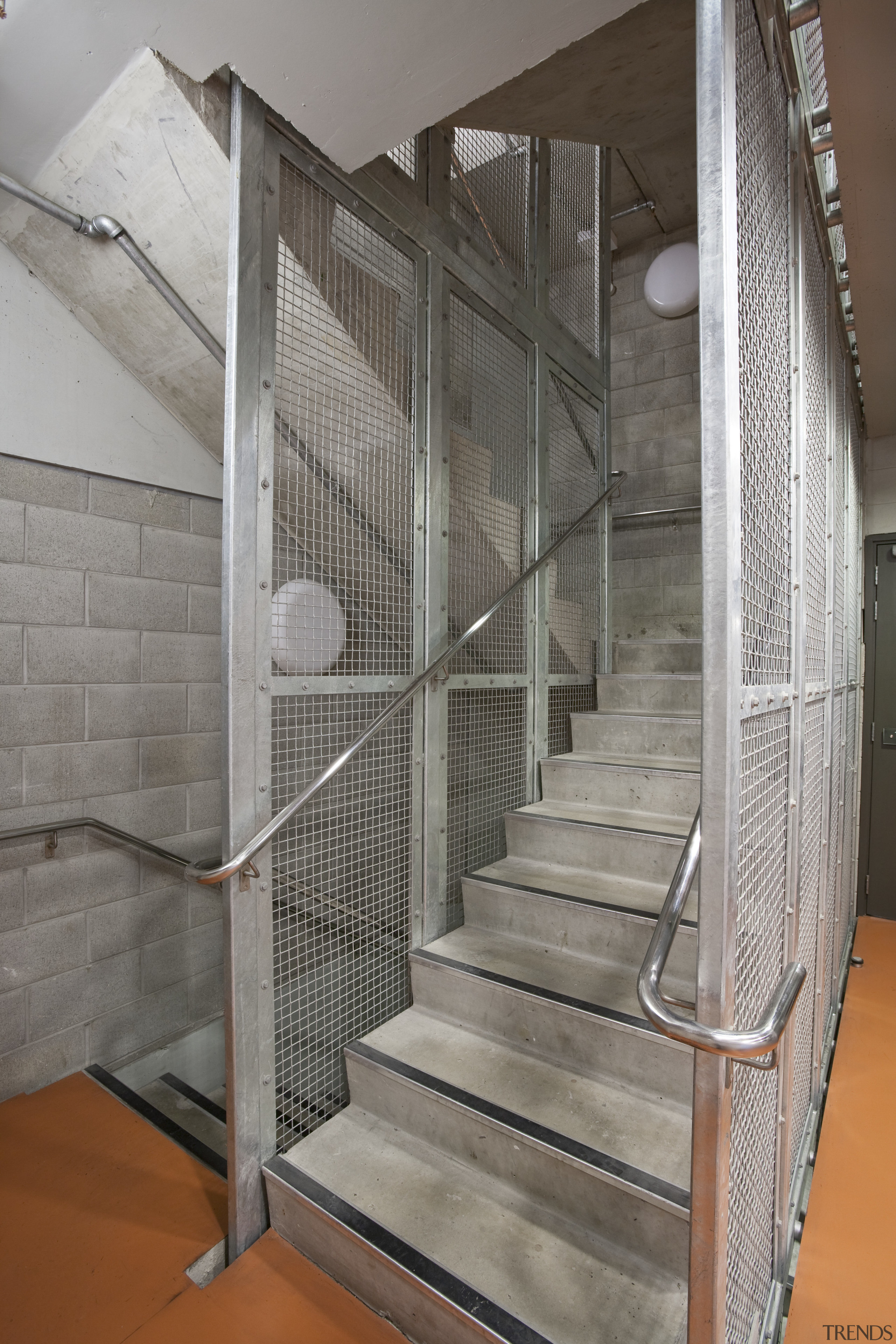 internal stairwell view of structural steel work by architecture, daylighting, glass, handrail, stairs, gray