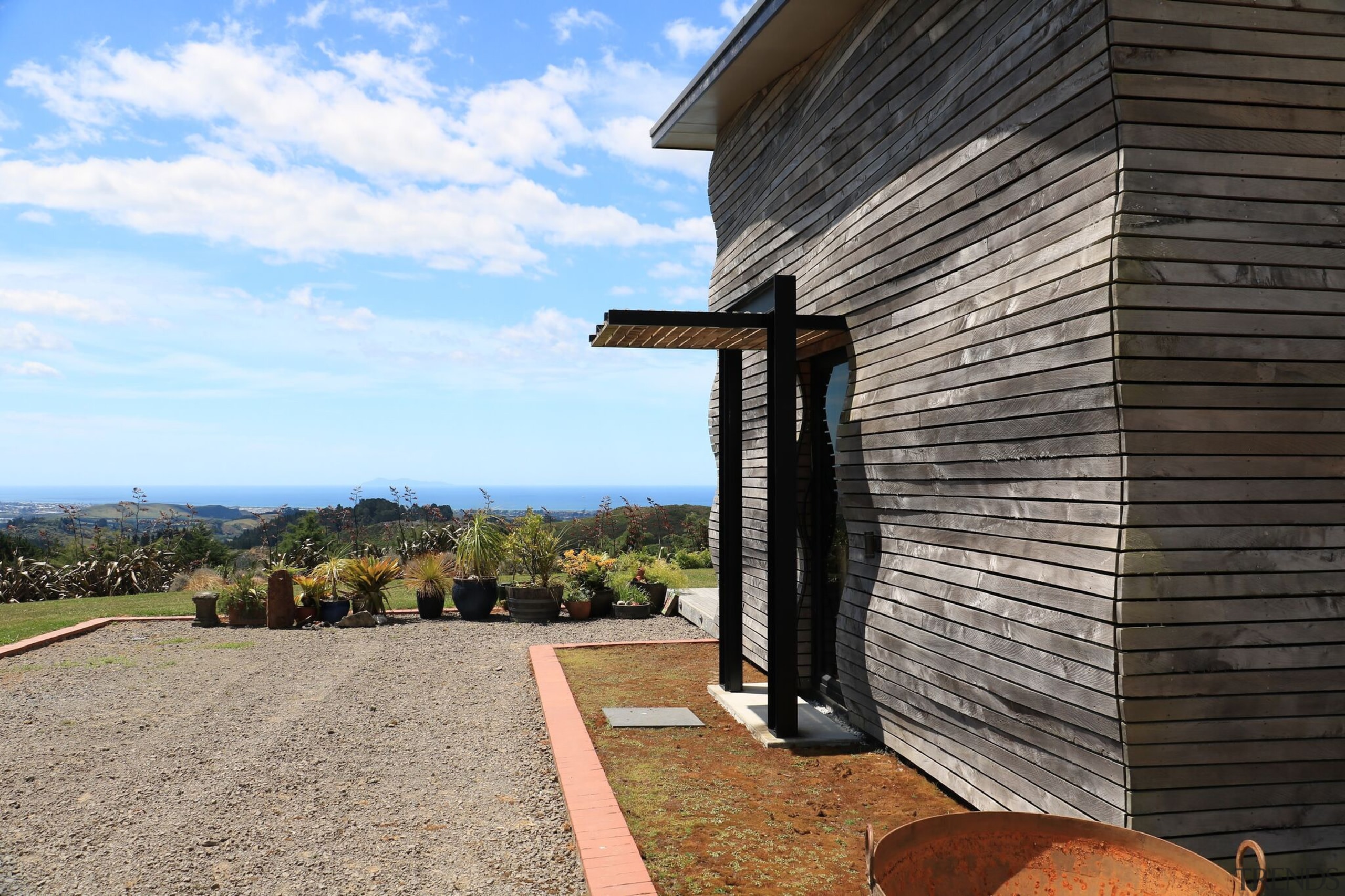 Finalist in Exterior Innovation &amp; Infrastructure (Category 7) architecture, building, cottage, home, house, property, real estate, sky, wood, black