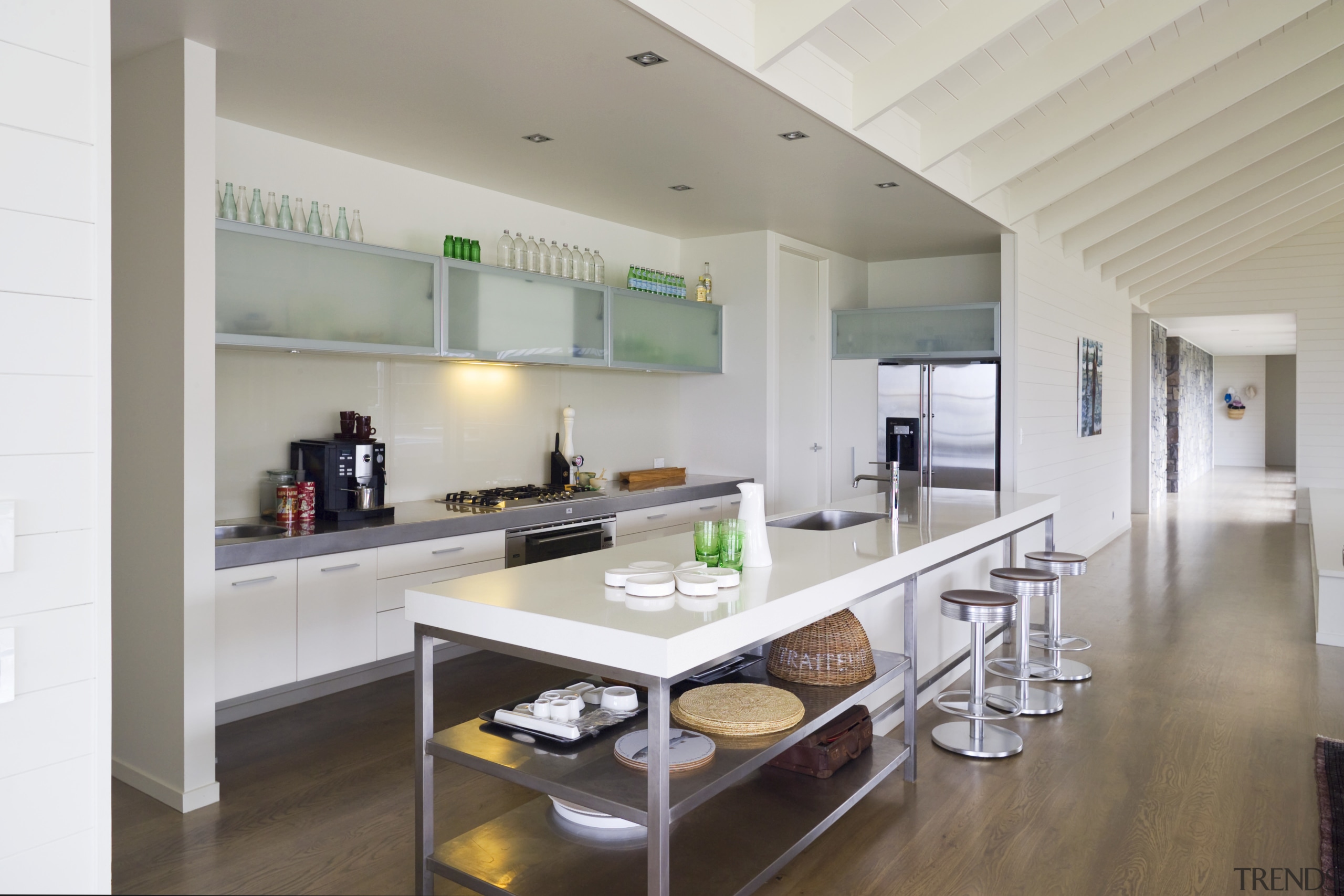 Open shelving under the kitchen island and simple, countertop, interior design, kitchen, real estate, gray