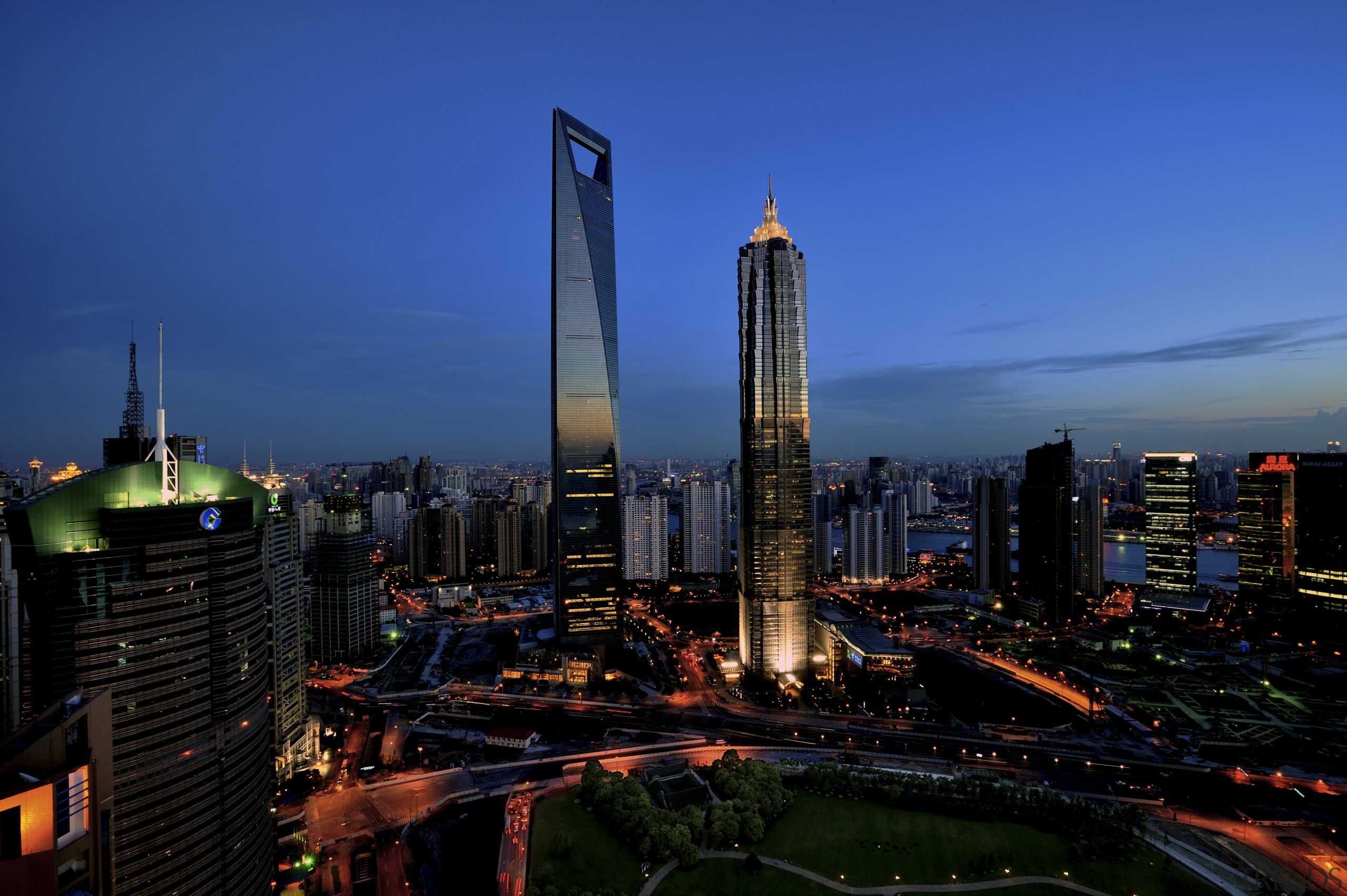 View of the Shanghai World Financial Centre in bird's eye view, building, city, cityscape, daytime, downtown, dusk, evening, horizon, landmark, metropolis, metropolitan area, night, sky, skyline, skyscraper, tourist attraction, tower, tower block, urban area, blue, black