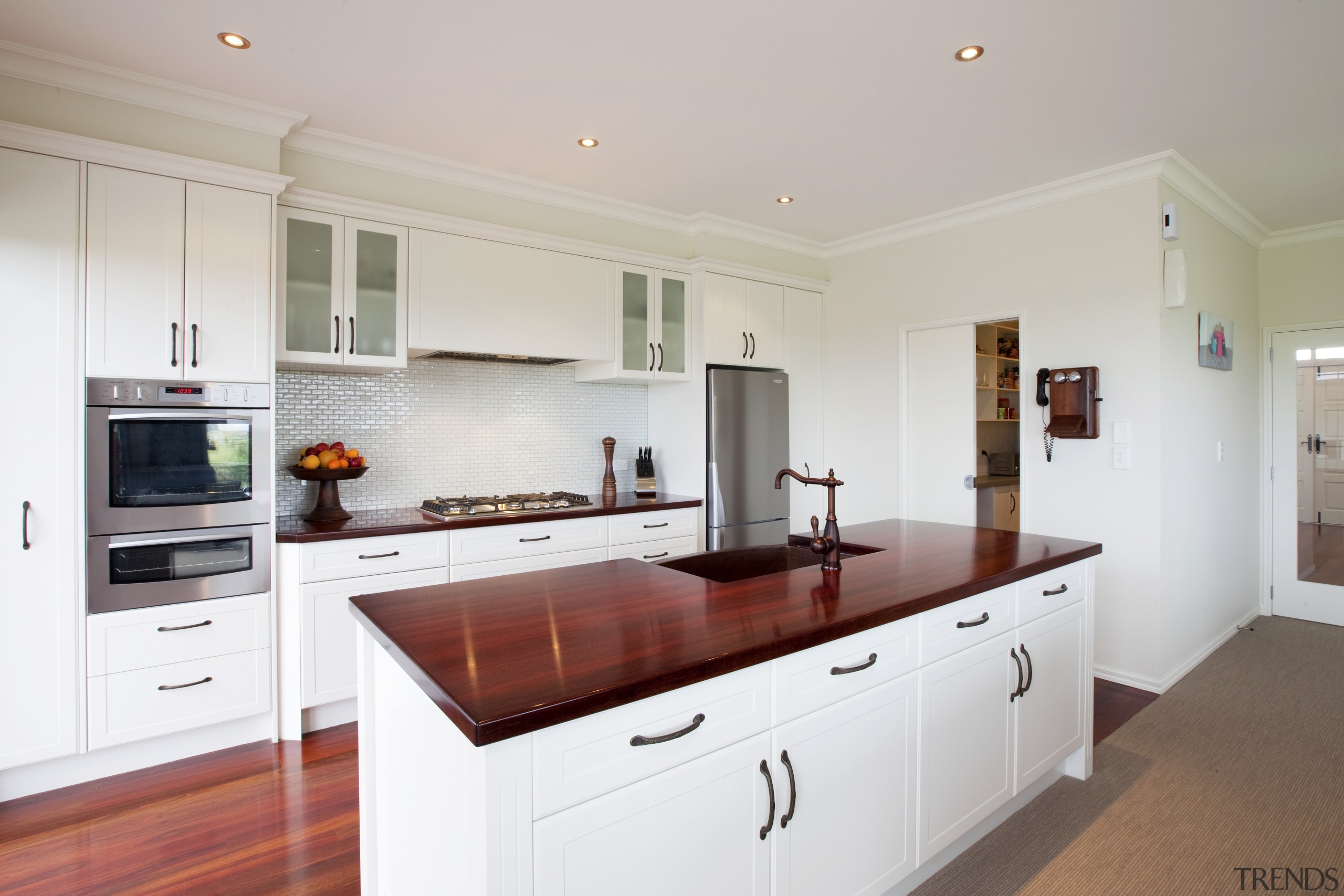 View of a kitchen which features wooden benchtops cabinetry, countertop, cuisine classique, interior design, kitchen, property, real estate, room, gray, white