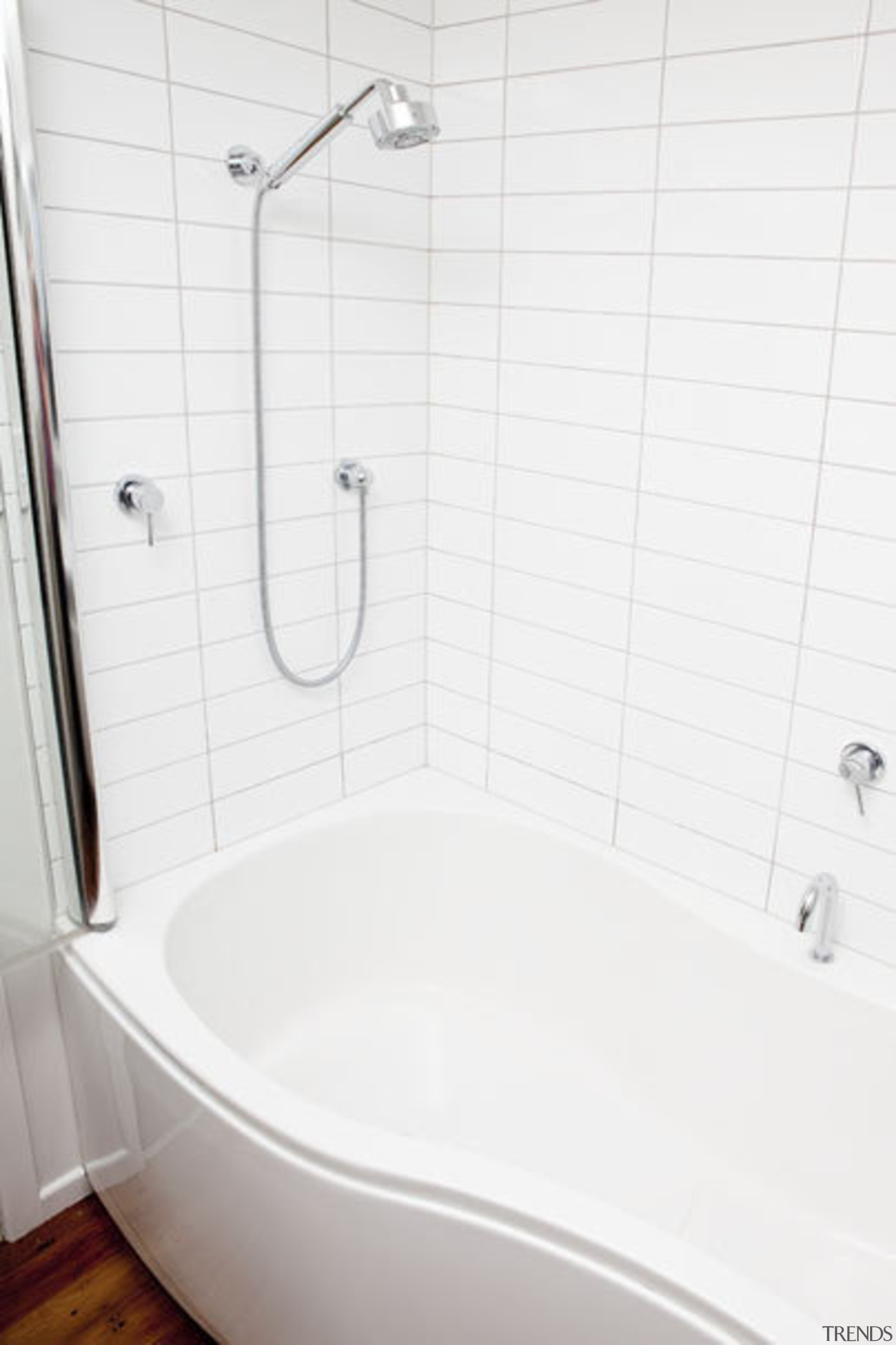 White tiled bathroom with white bath. - White angle, bathroom, bathroom sink, bathtub, floor, plumbing fixture, product, product design, room, tap, tile, toilet seat, wall, white