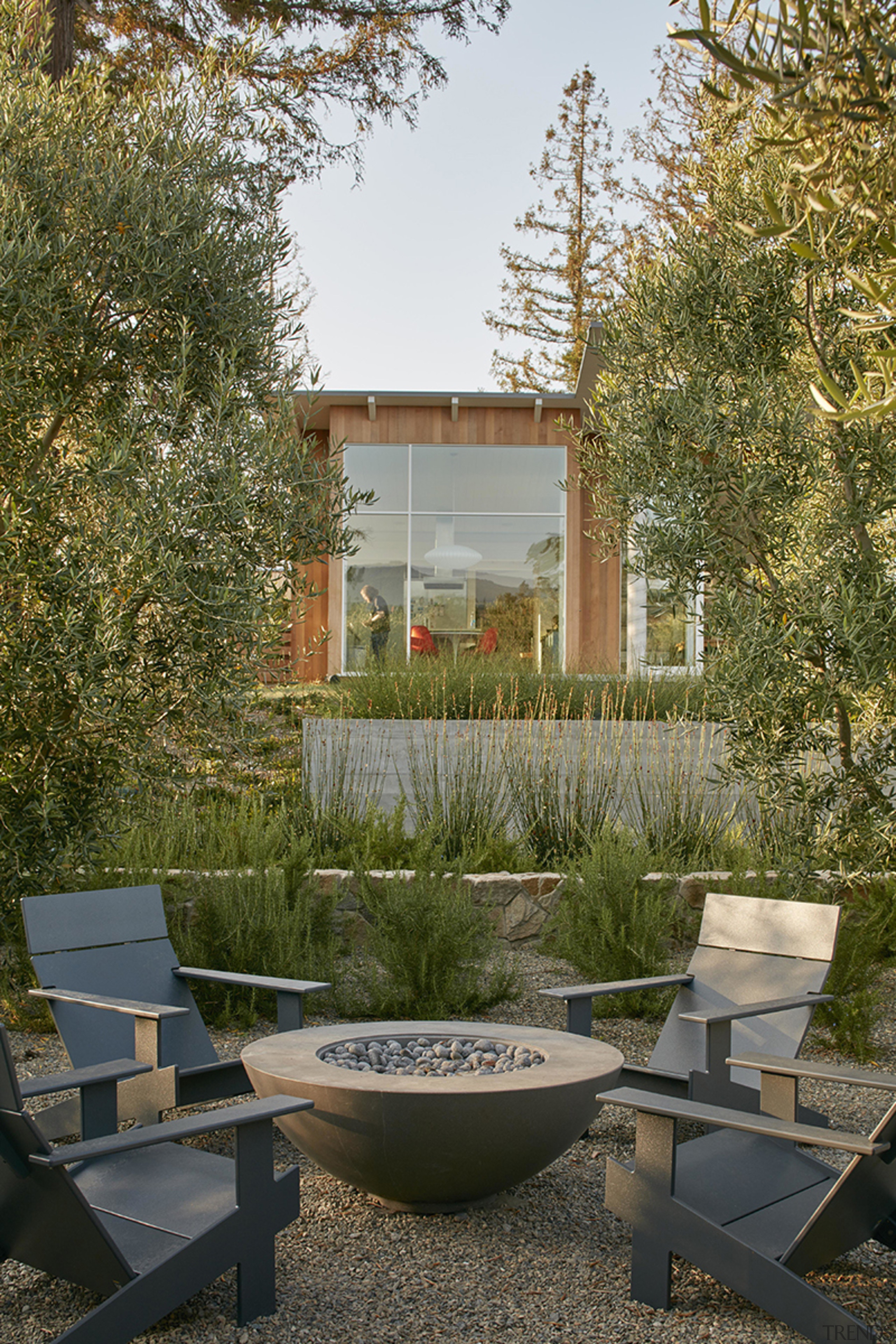 A tucked away fire pit provides an additional 