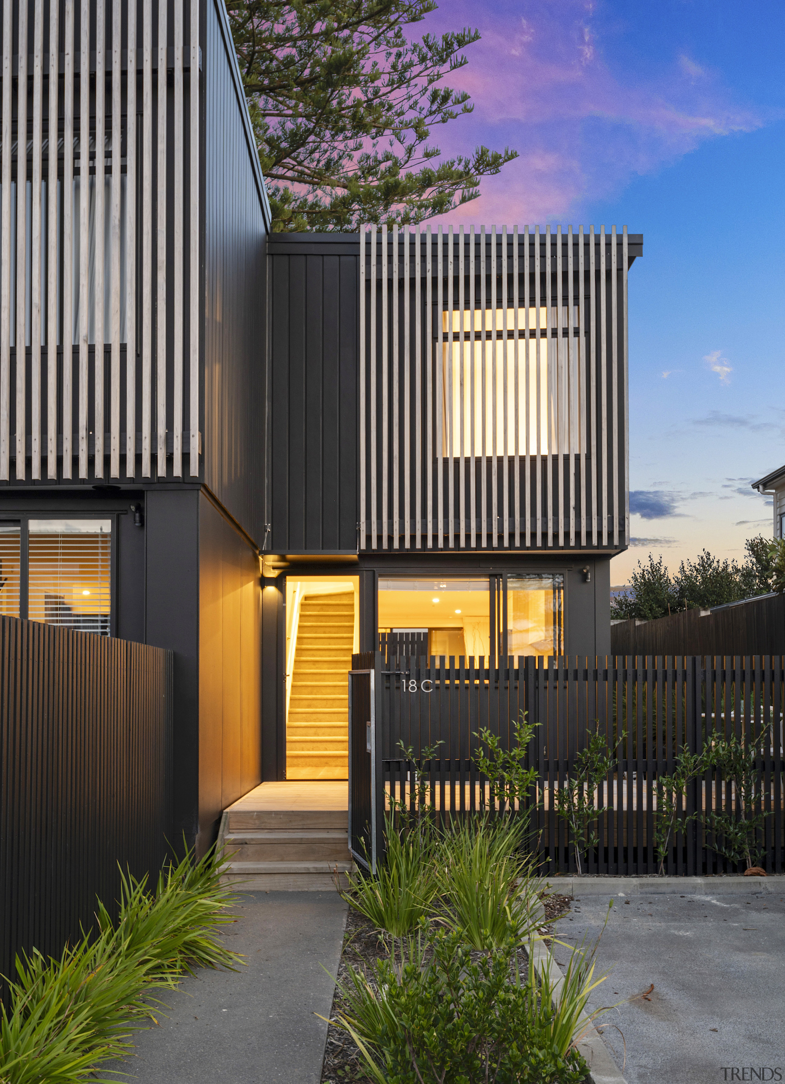 Front entry at dusk. - Medium density, maximum 