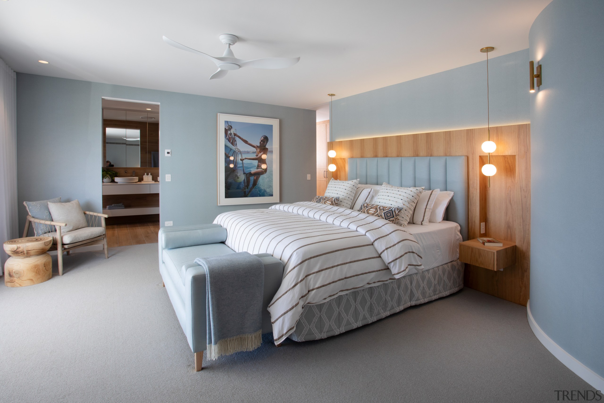 Master bedroom in waterside-appropriate tones. 