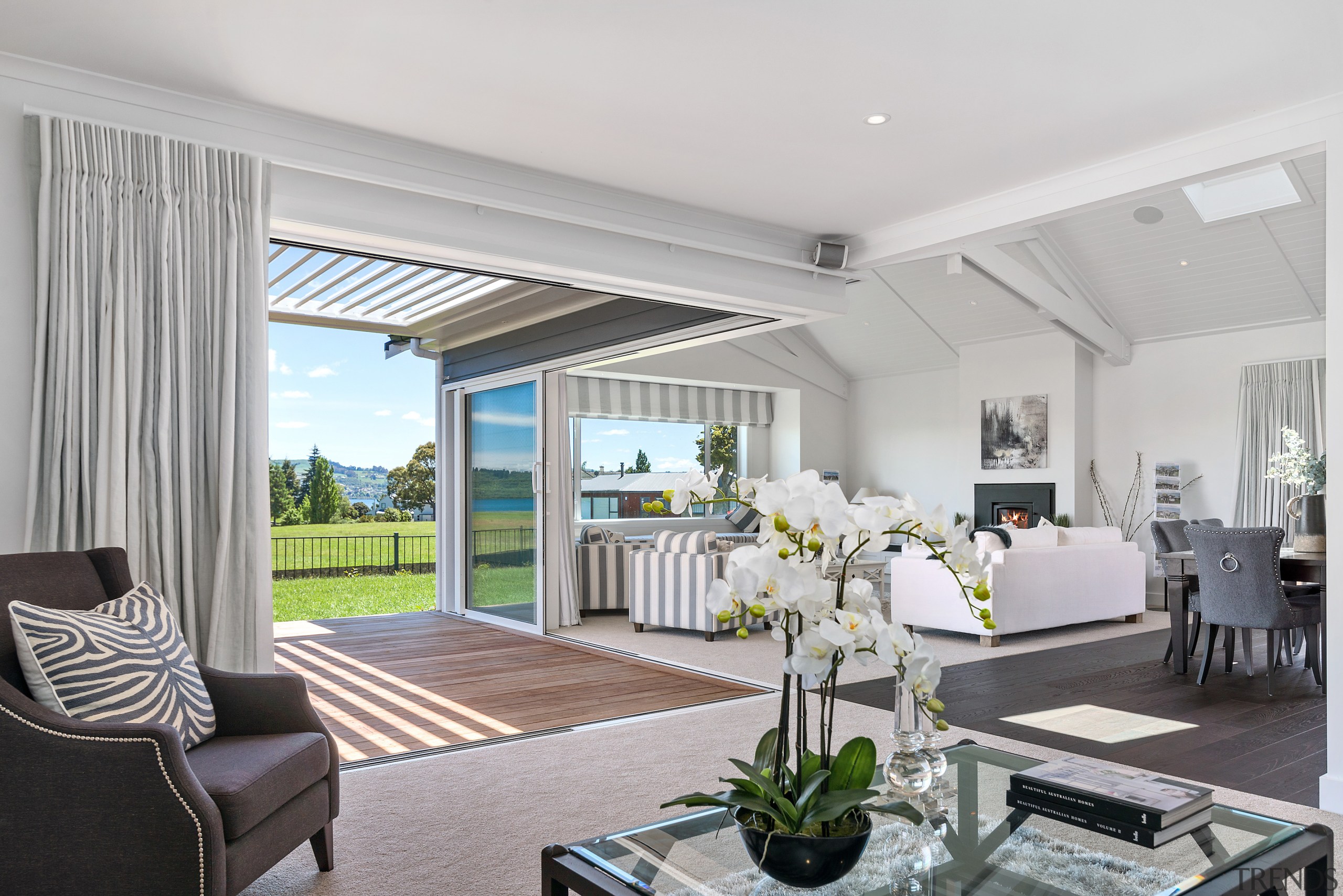 Large sliding exterior doors retract into a wall 