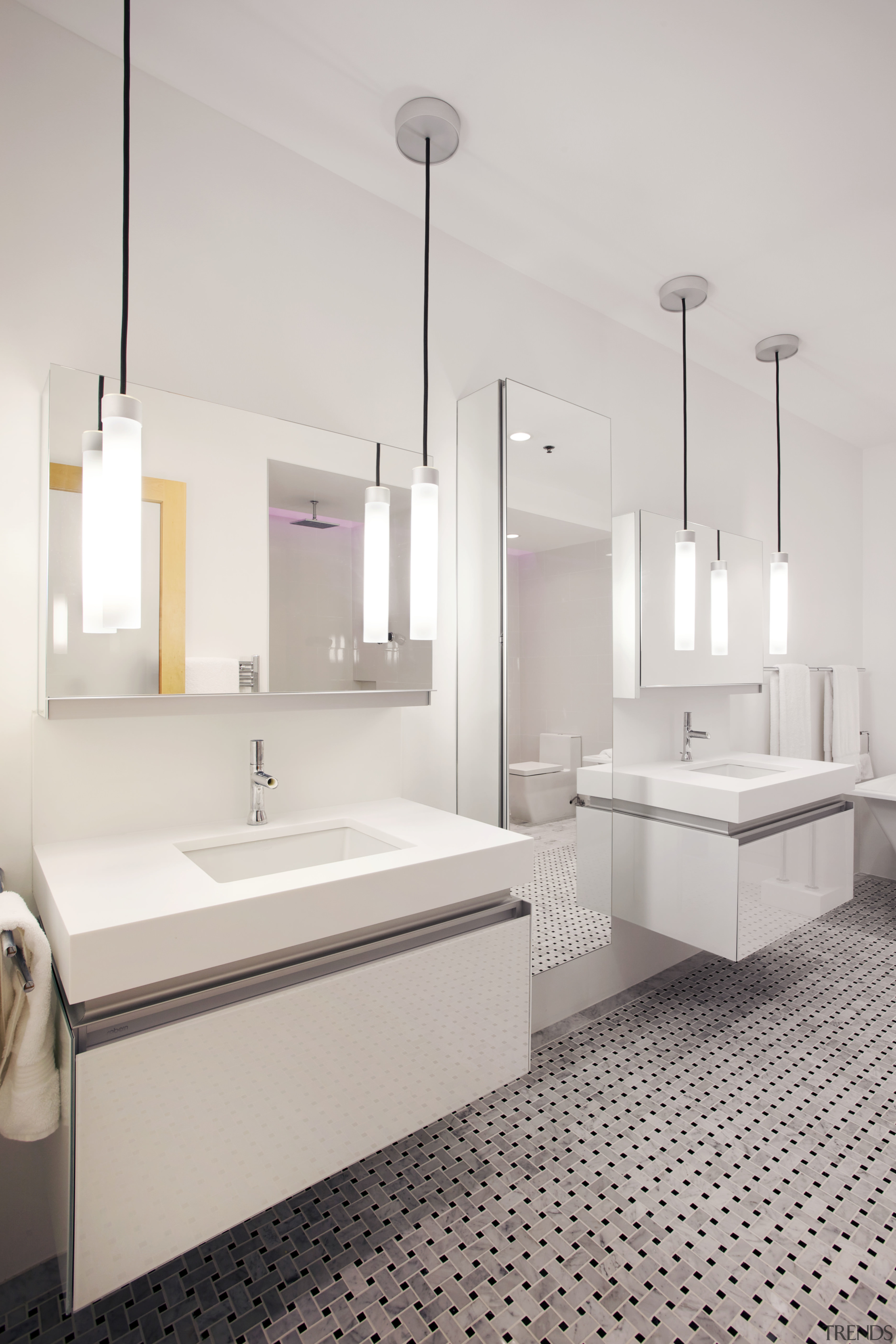 Matching his-and-hers cantilevered vanities bring a crisp, contemporary bathroom, bathroom sink, floor, interior design, plumbing fixture, product design, sink, tap, gray