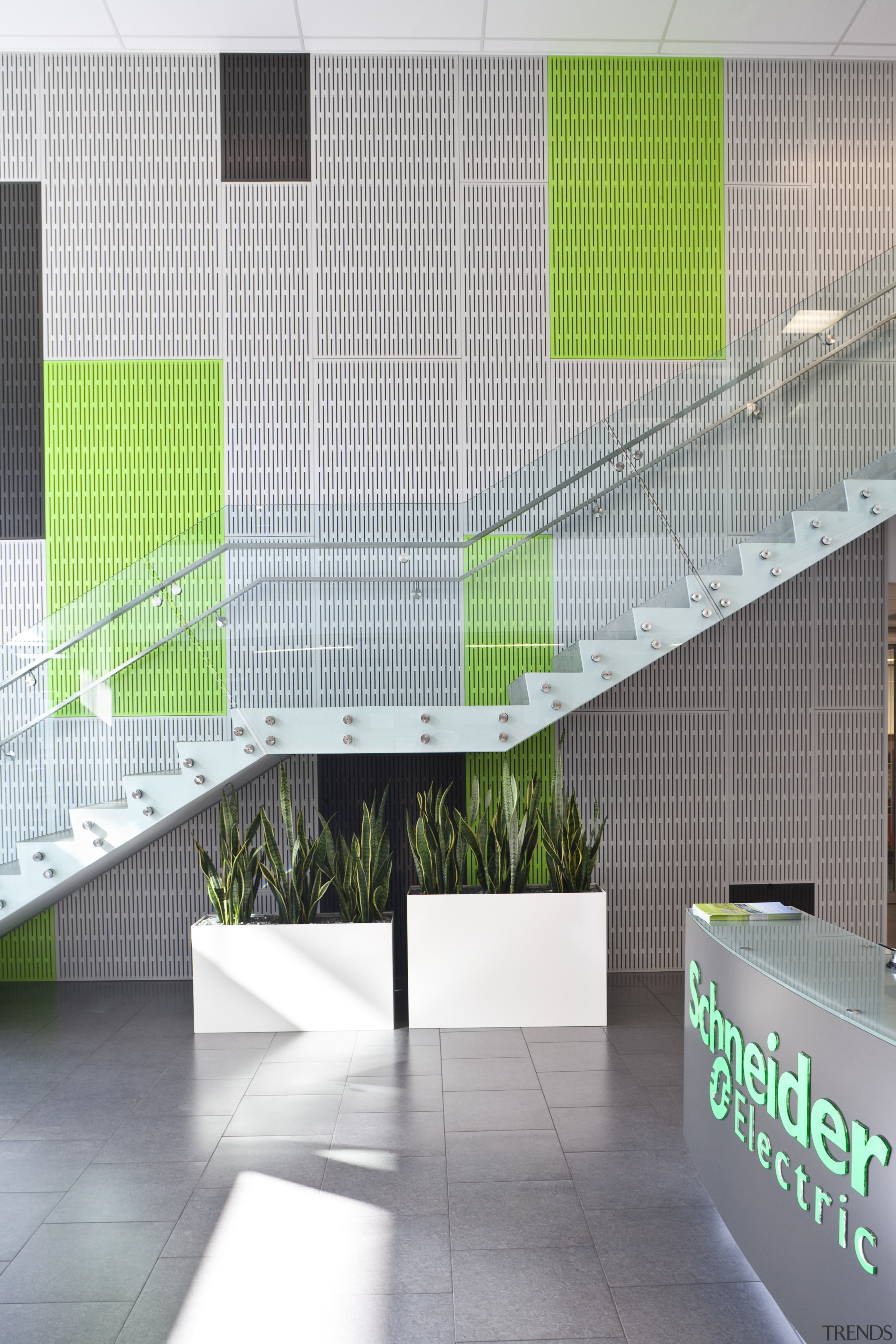 Schneider Electric reflects the latest energy options in angle, architecture, daylighting, glass, green, house, interior design, line, product, product design, wall, white, gray