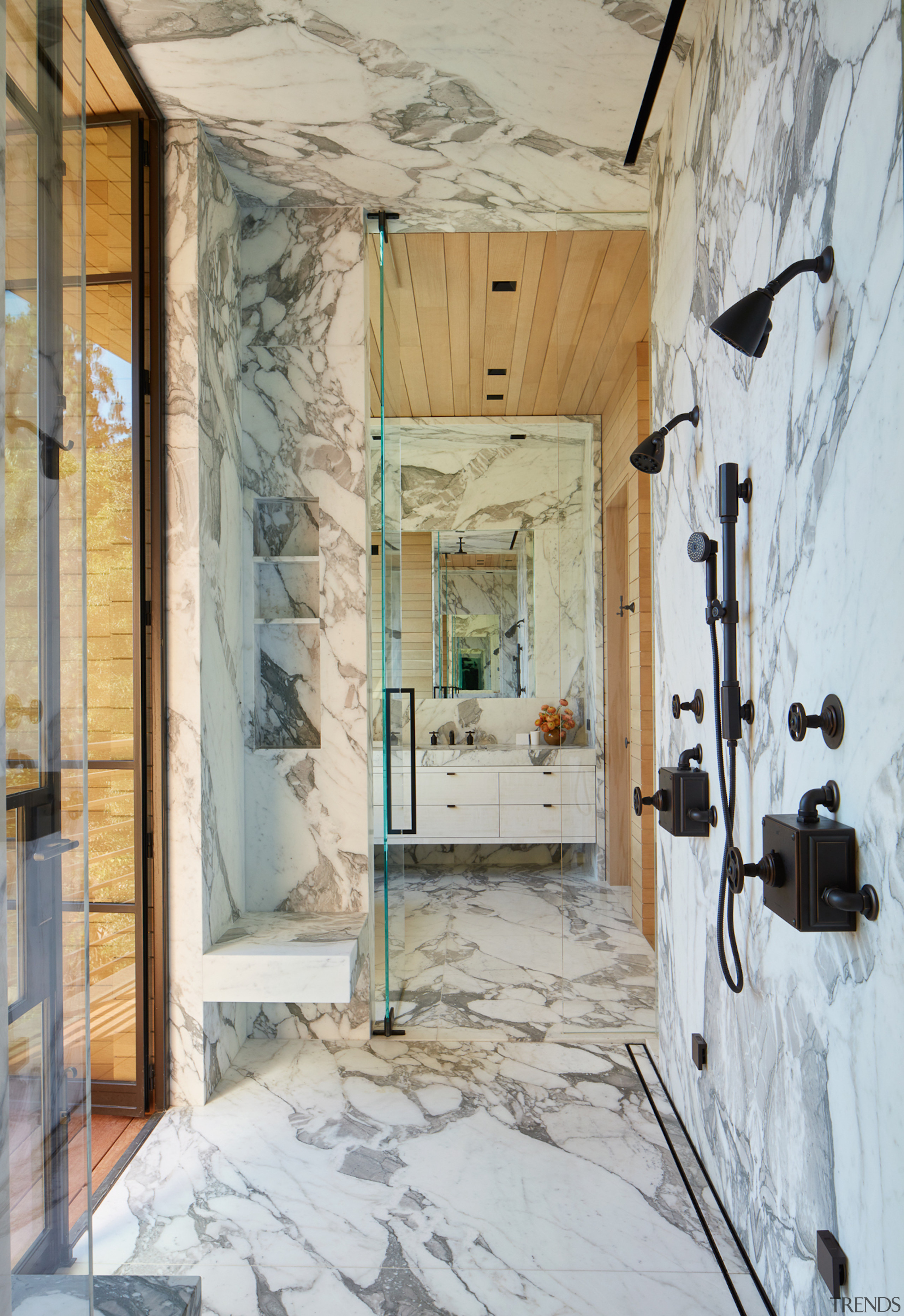 The master bathroom includes a substantial shower environment 