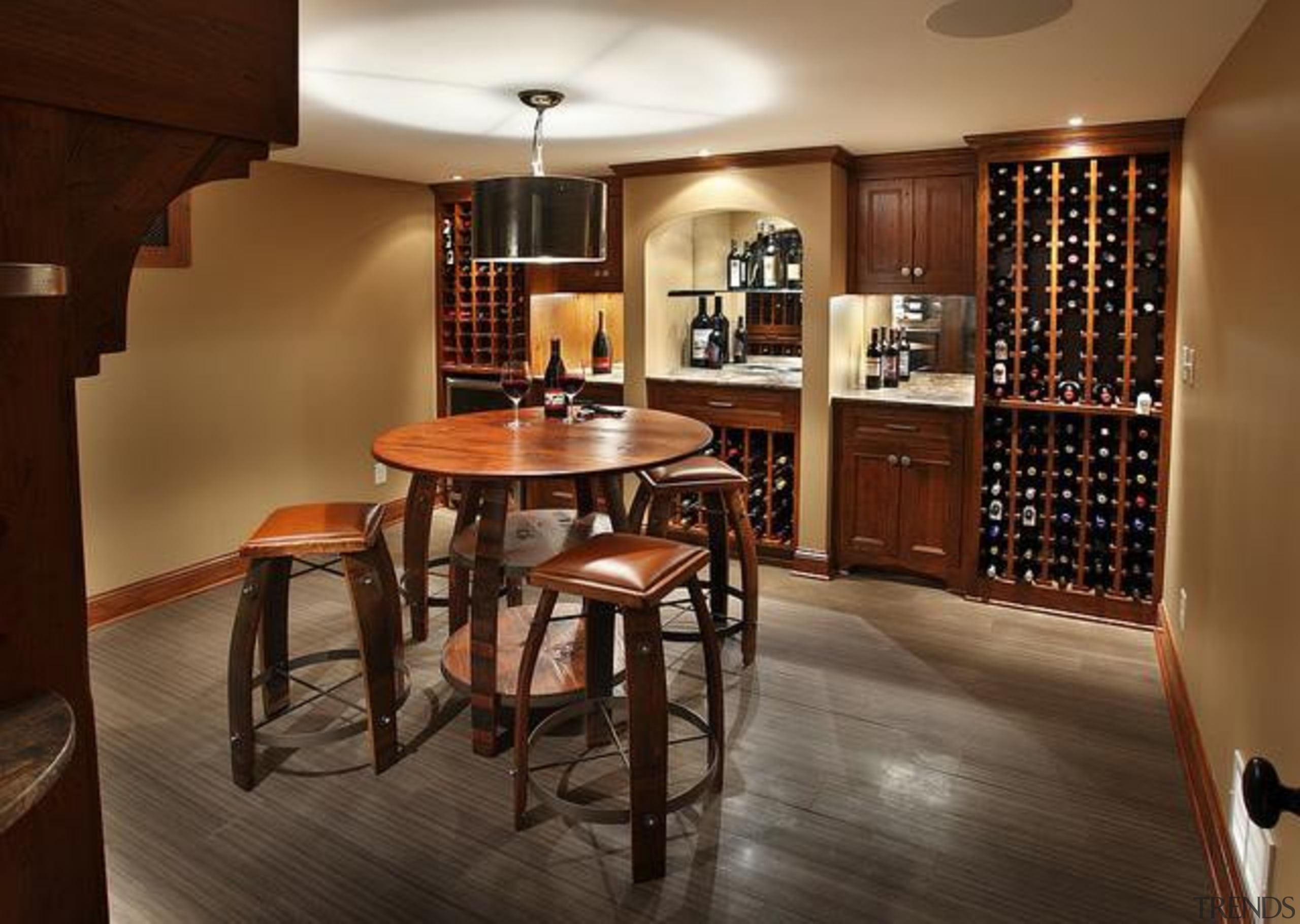 Because of its expansive and wide-open layout, a cabinetry, dining room, floor, flooring, furniture, hardwood, interior design, room, table, wood, brown