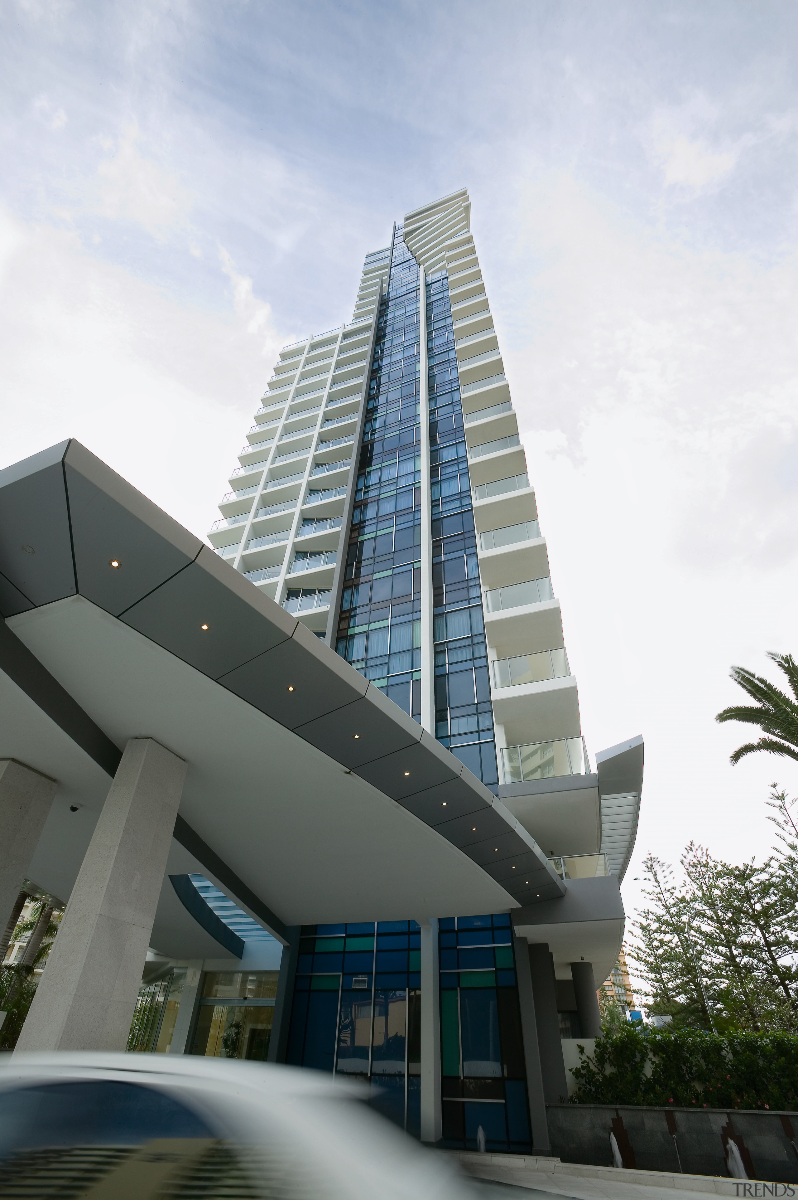 An exterior view of the Artique apartment complex apartment, architecture, building, commercial building, condominium, corporate headquarters, daytime, headquarters, metropolitan area, mixed use, real estate, residential area, sky, skyscraper, tower block, white