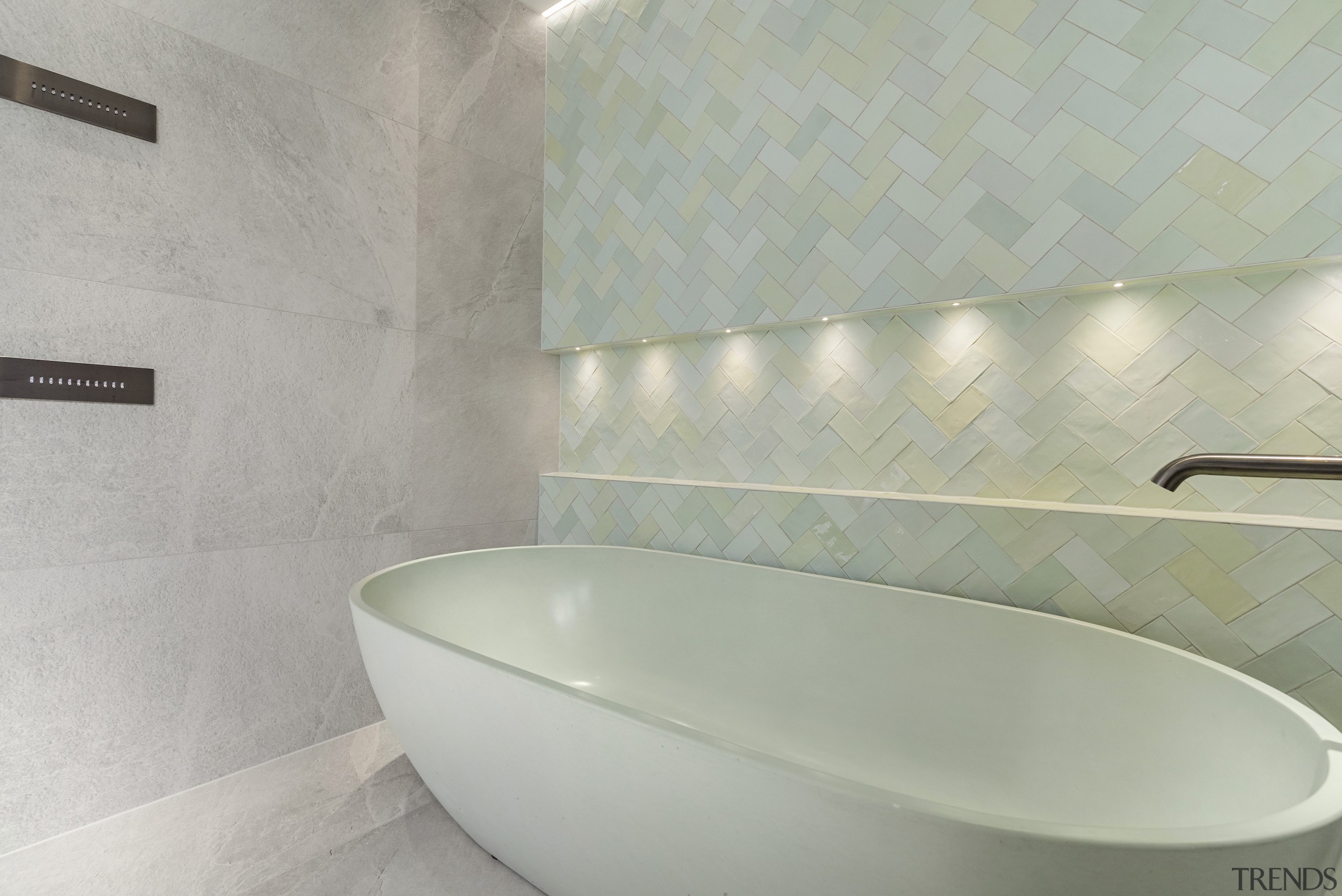 Concealed lighting brushes the tilework to attractive effect. 