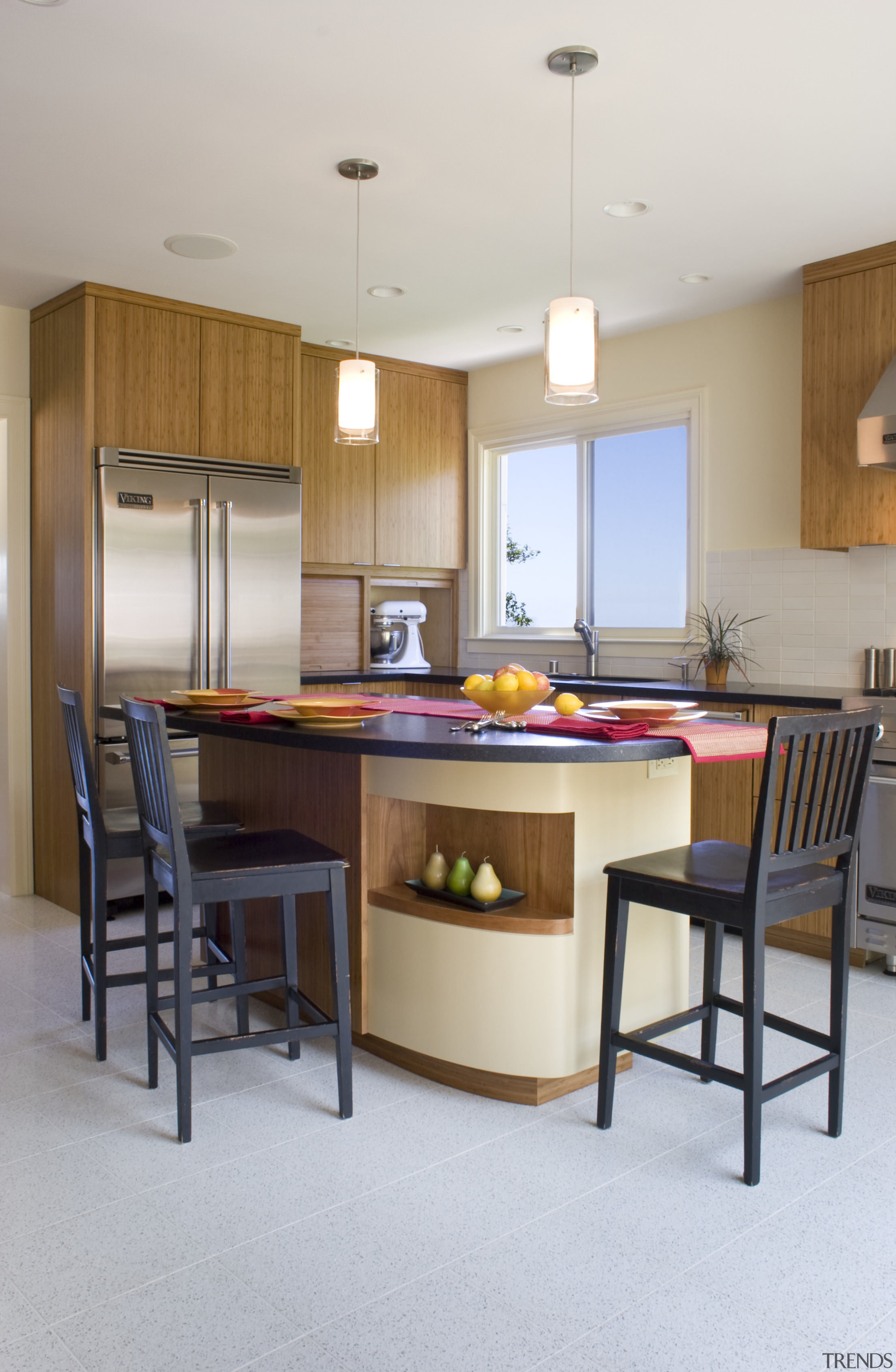 The front of the island is a focal cabinetry, countertop, interior design, kitchen, room, table, gray