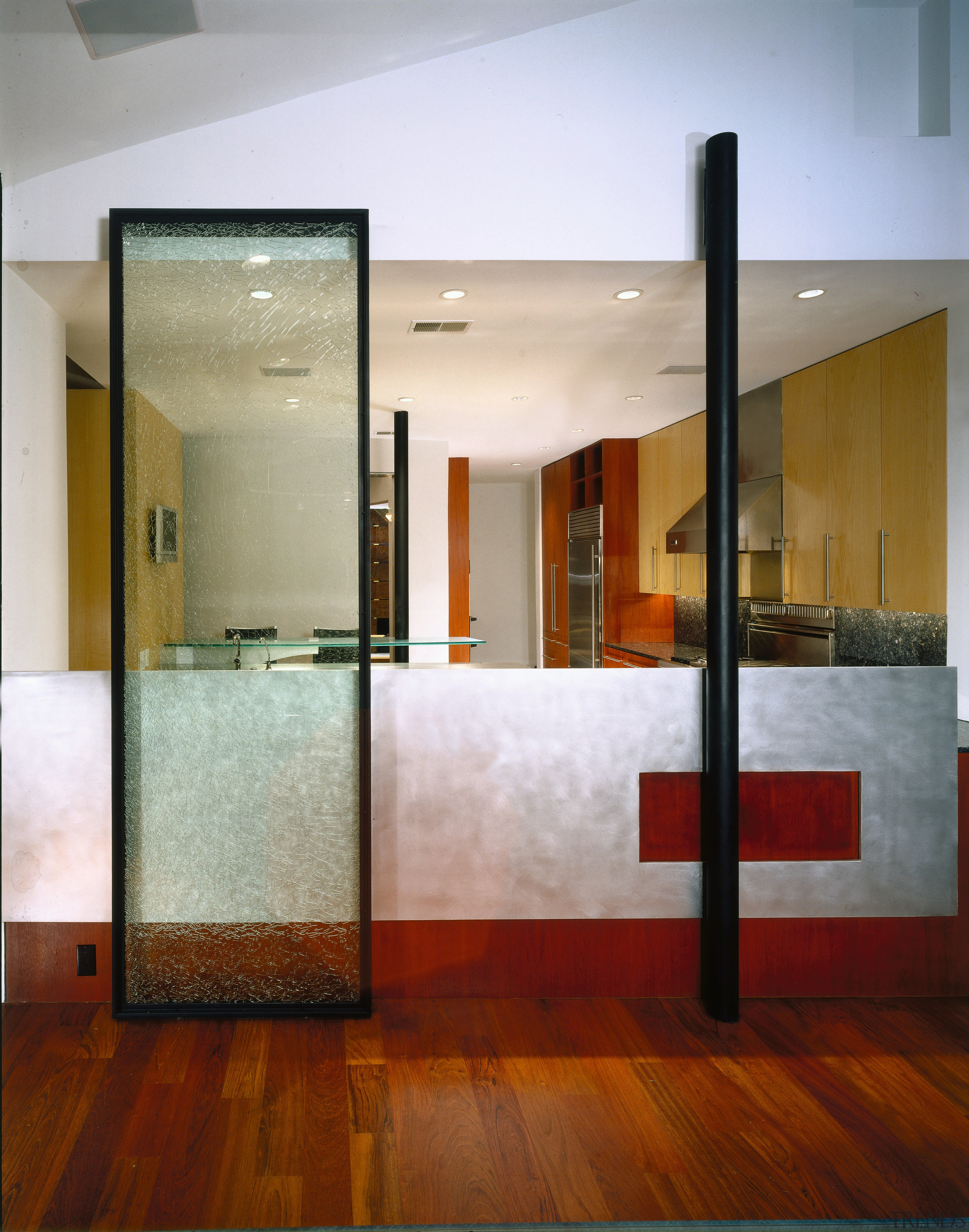 A view of the dividing wall between the architecture, ceiling, door, floor, flooring, glass, interior design, lobby, wall, gray