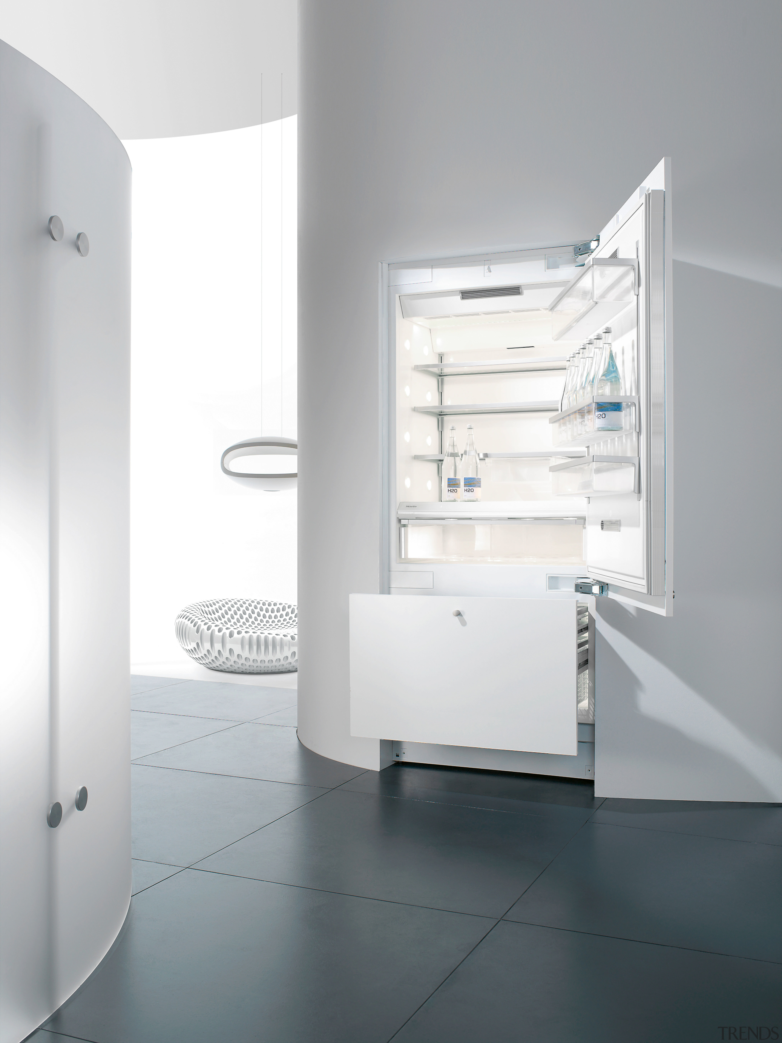 A view of a Miele fridge. - A bathroom, bathroom accessory, bathroom cabinet, home appliance, interior design, major appliance, product, product design, tap, gray, white