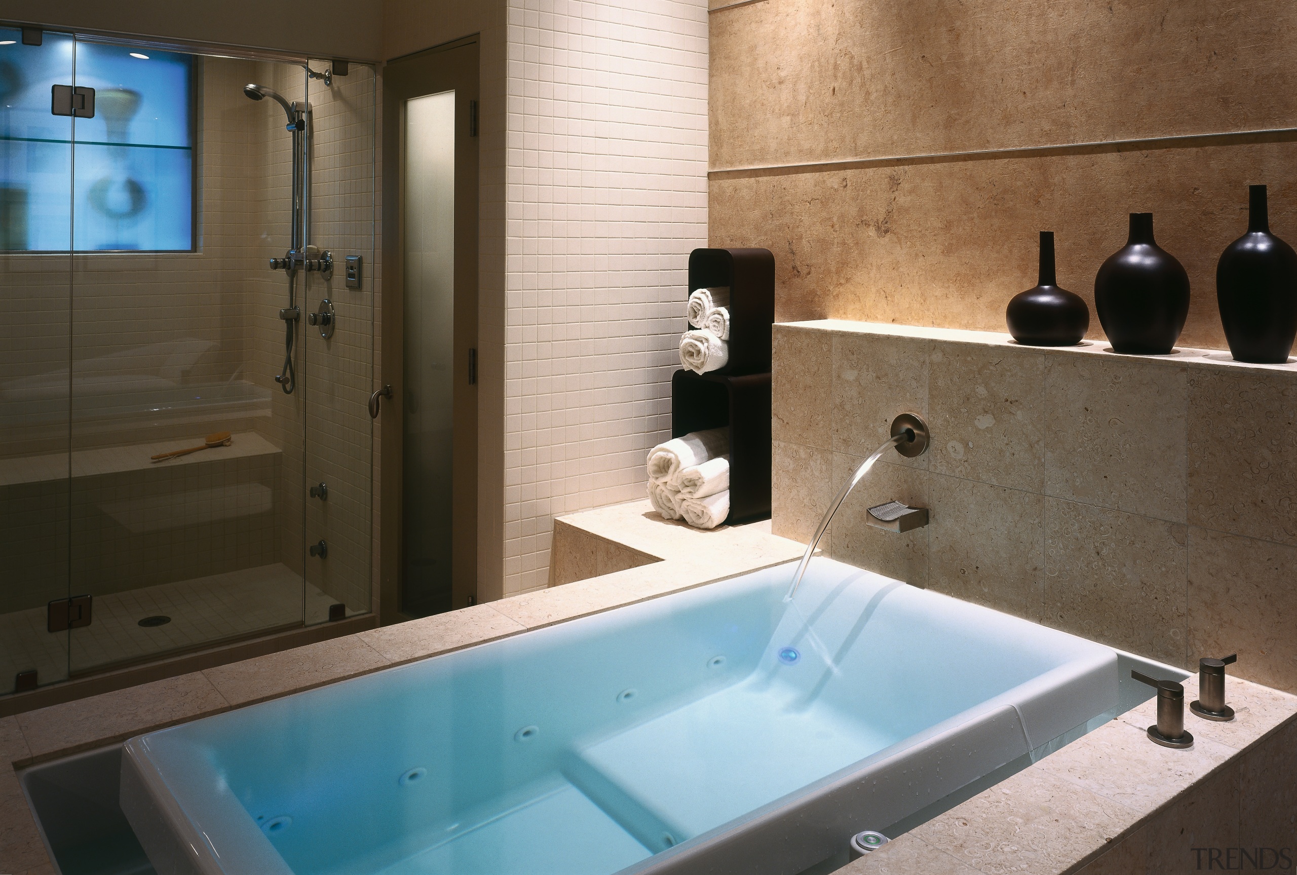 view of the soaking tub with overflow channel, bathroom, bathtub, interior design, plumbing fixture, room, black