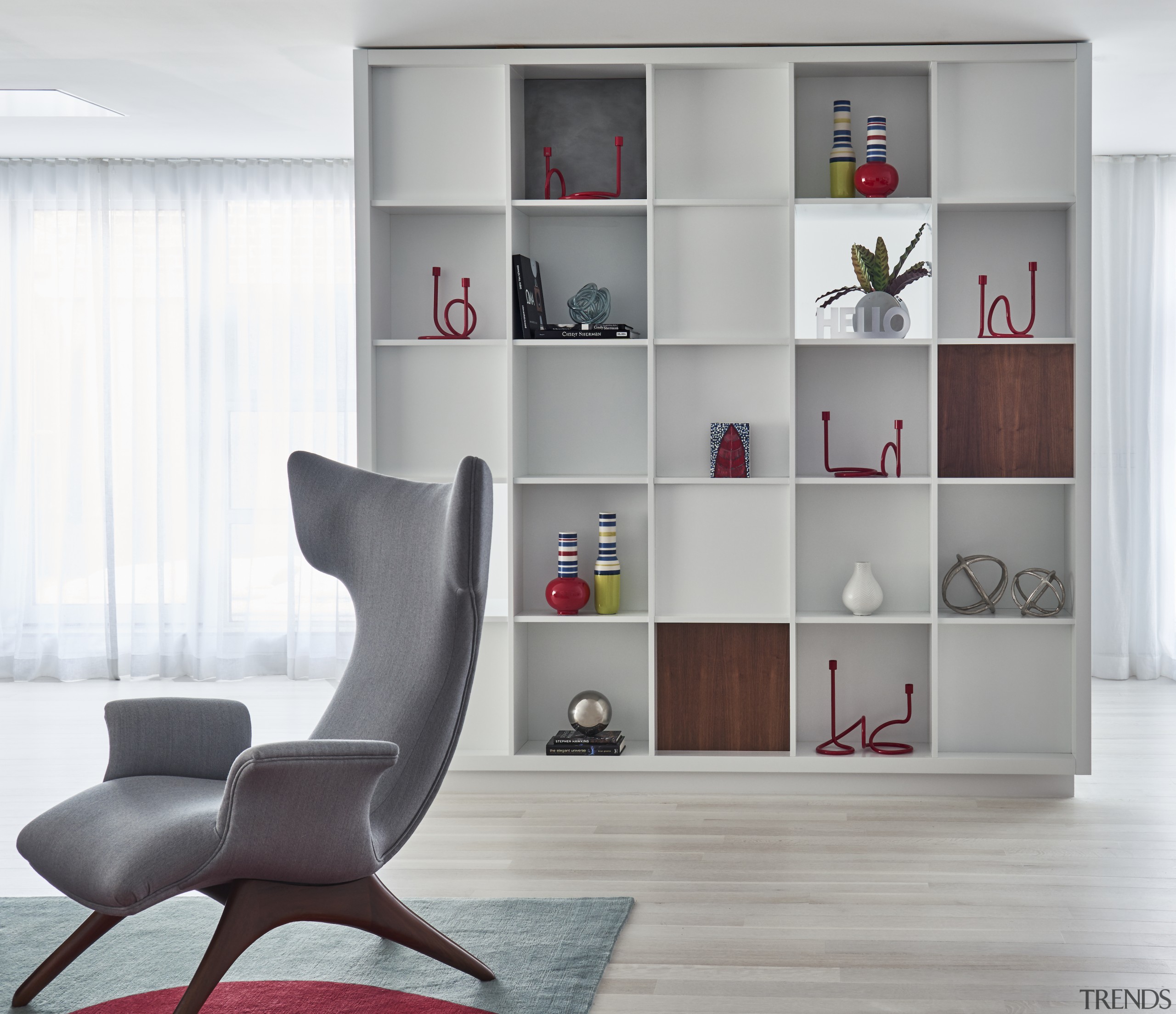 This custom bookcase/room divider was designed based on 