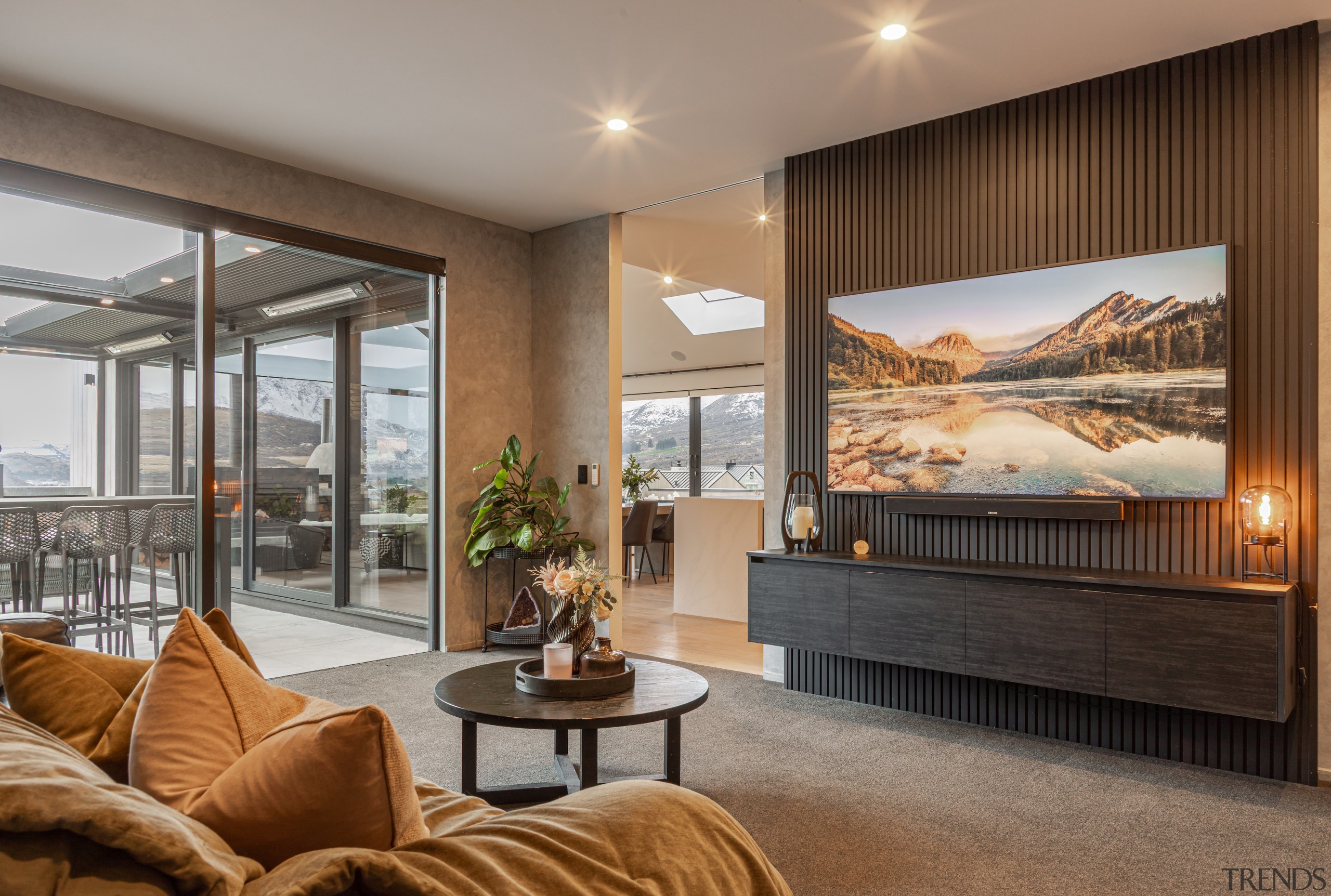 Media area adjacent to the kitchen and outdoor 