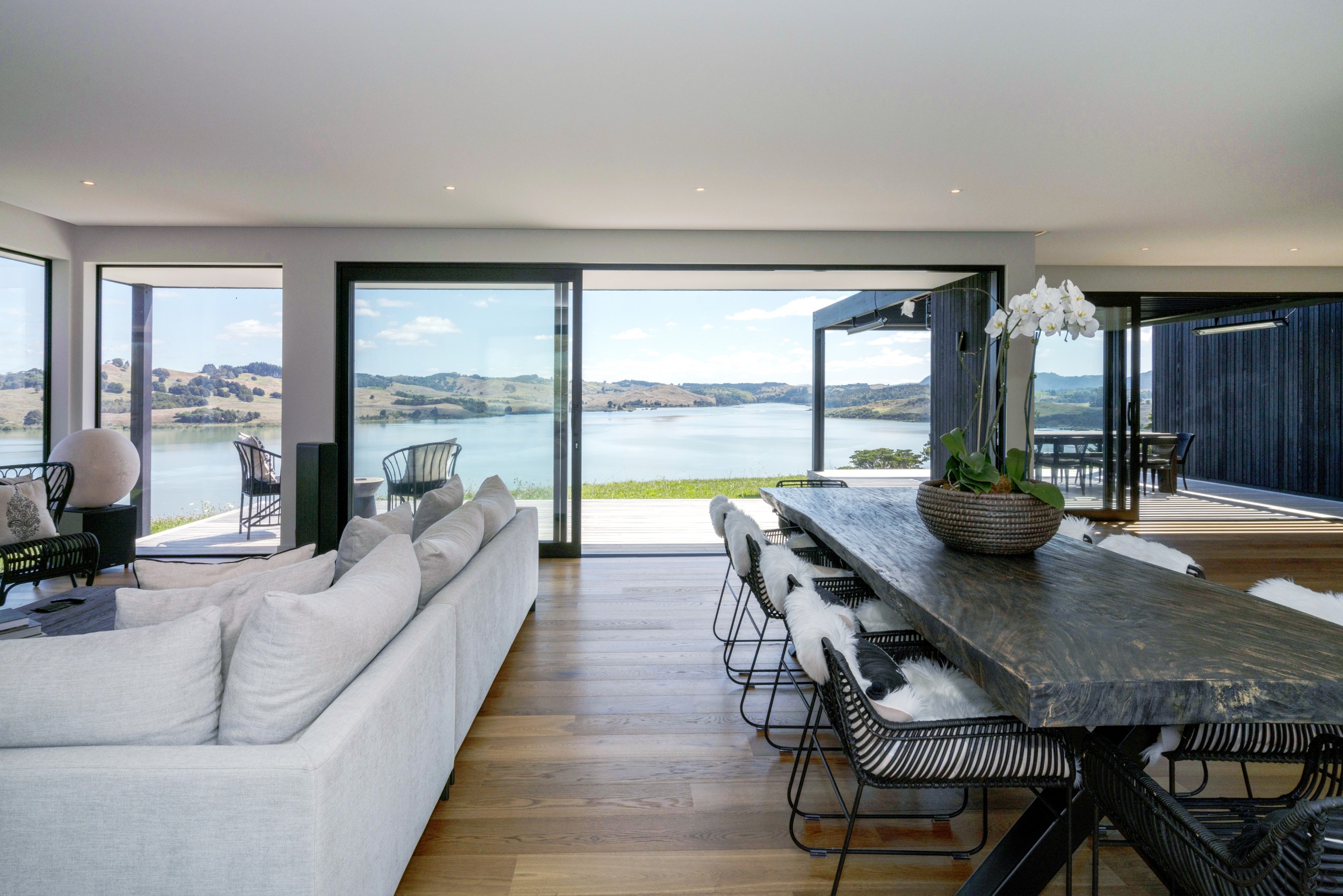 ​​​​​​​Floor-to-near-ceiling windows and sliding doors make the most 