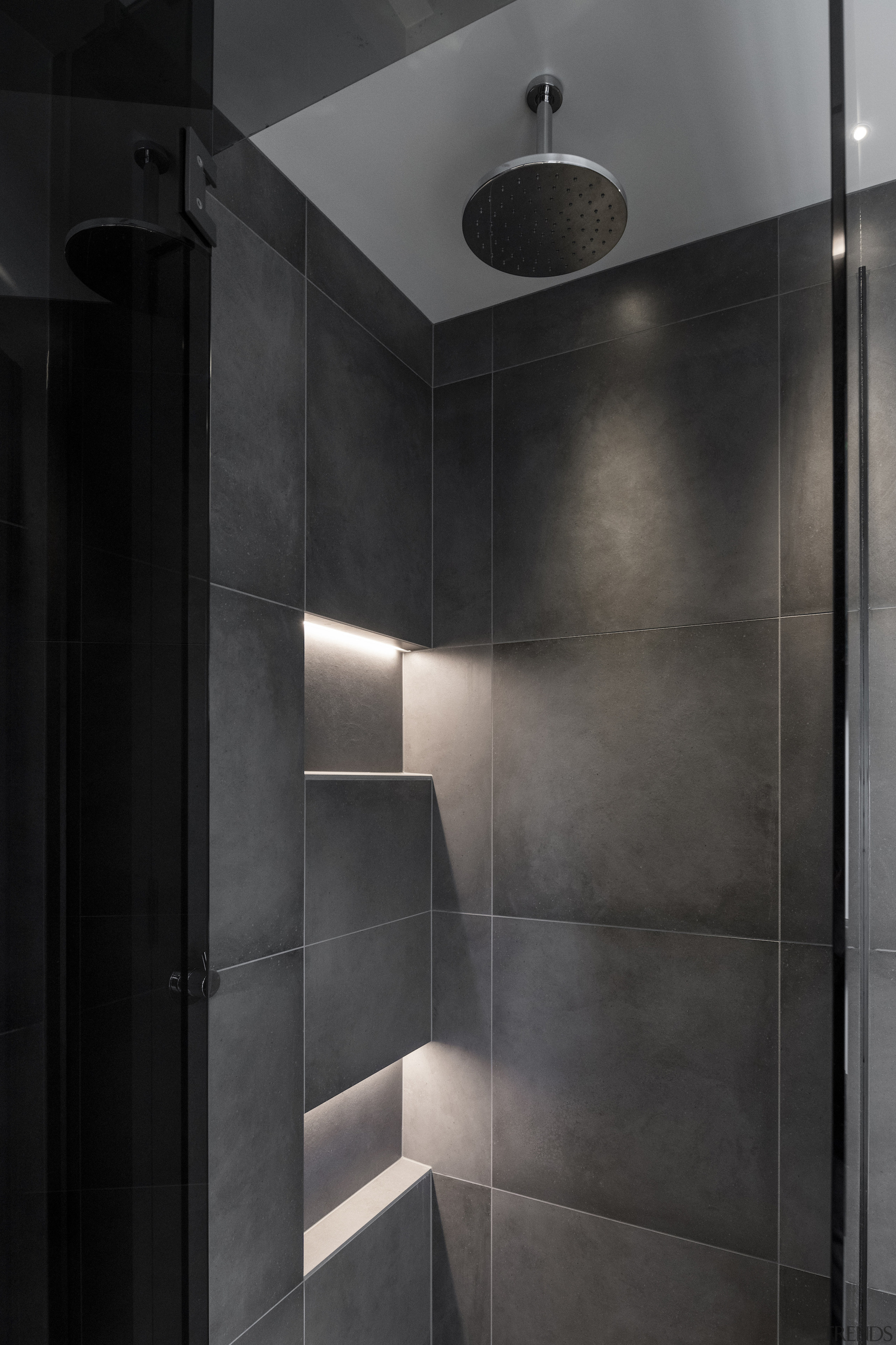 The hidden light detail to the shower recesses 