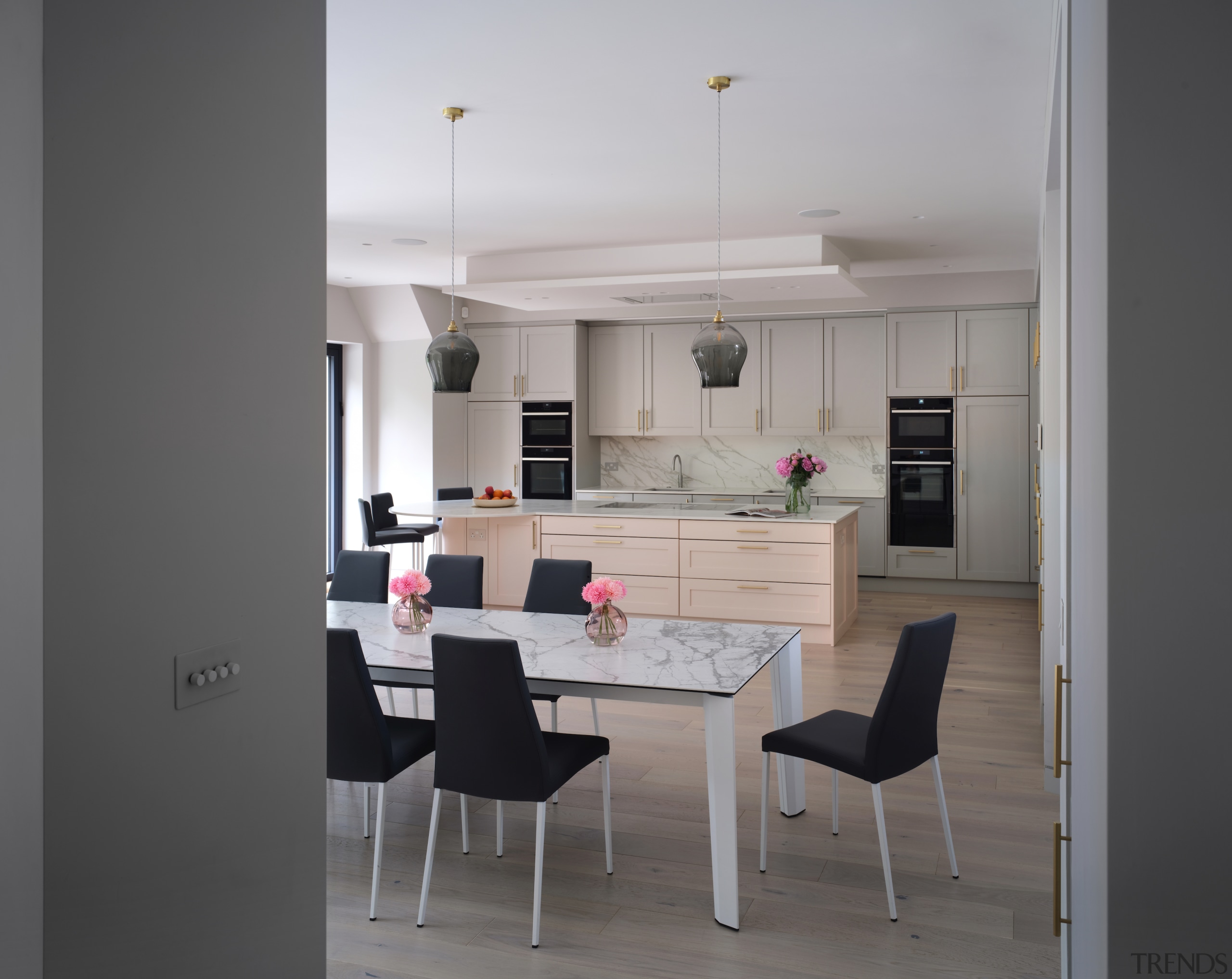 The kitchen with classic cabinet fronts and pale 