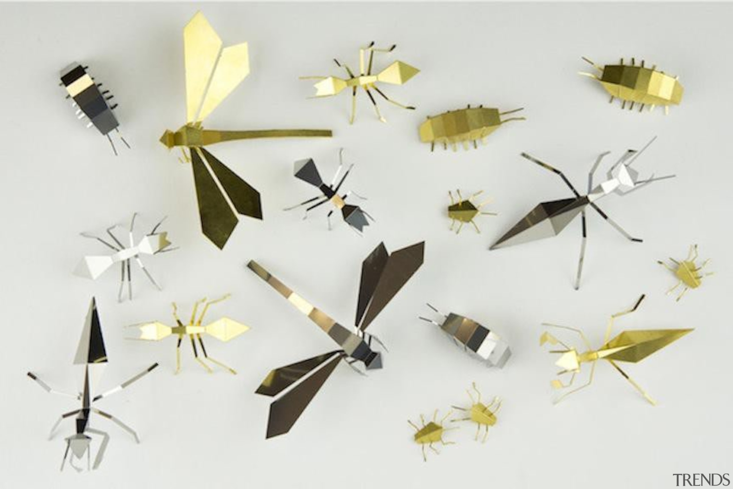 Poligon is a collection of foldable metallic sculptures insect, invertebrate, moths and butterflies, pollinator, product design, white