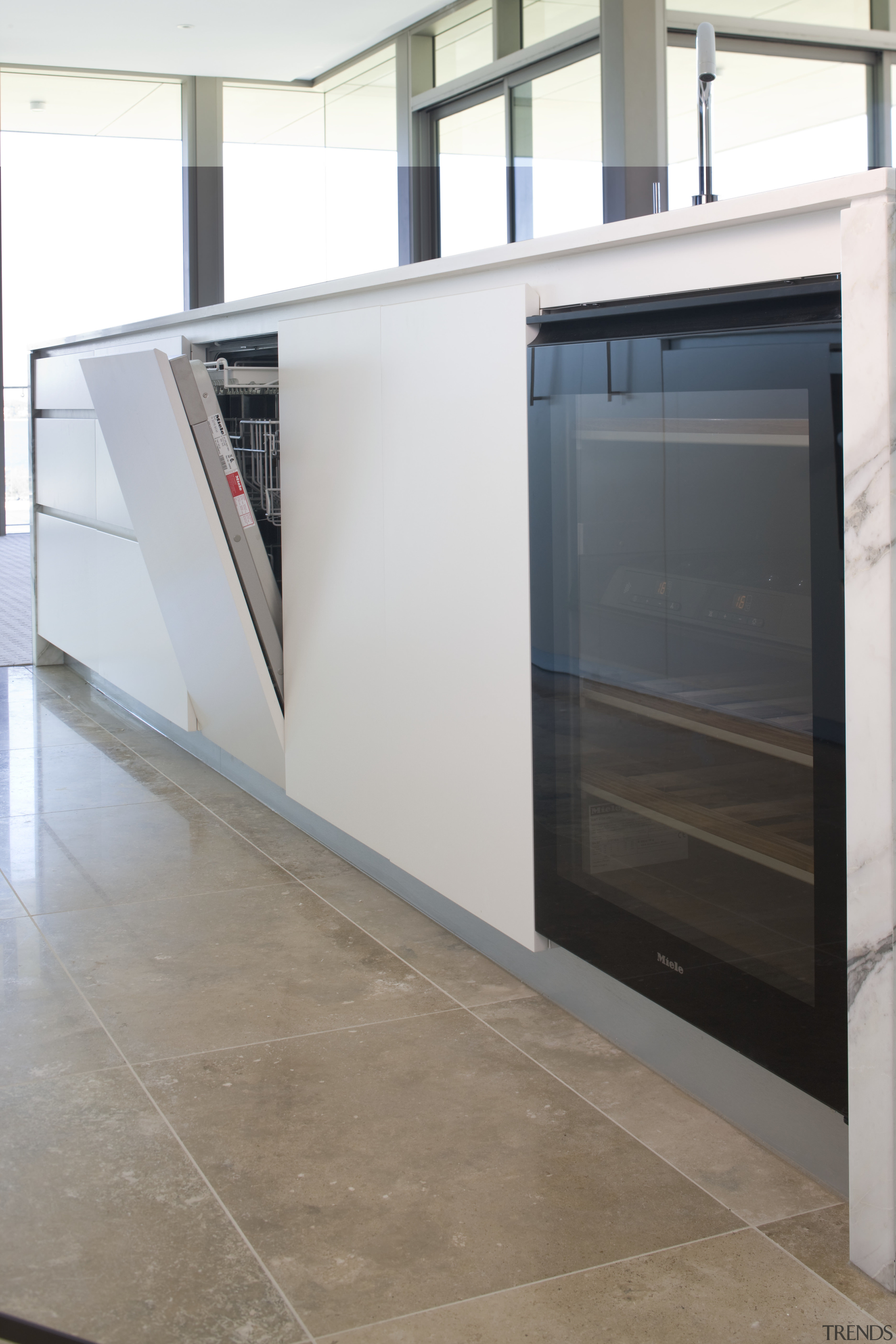 View of dishwasher and wine cooler. - View floor, glass, white