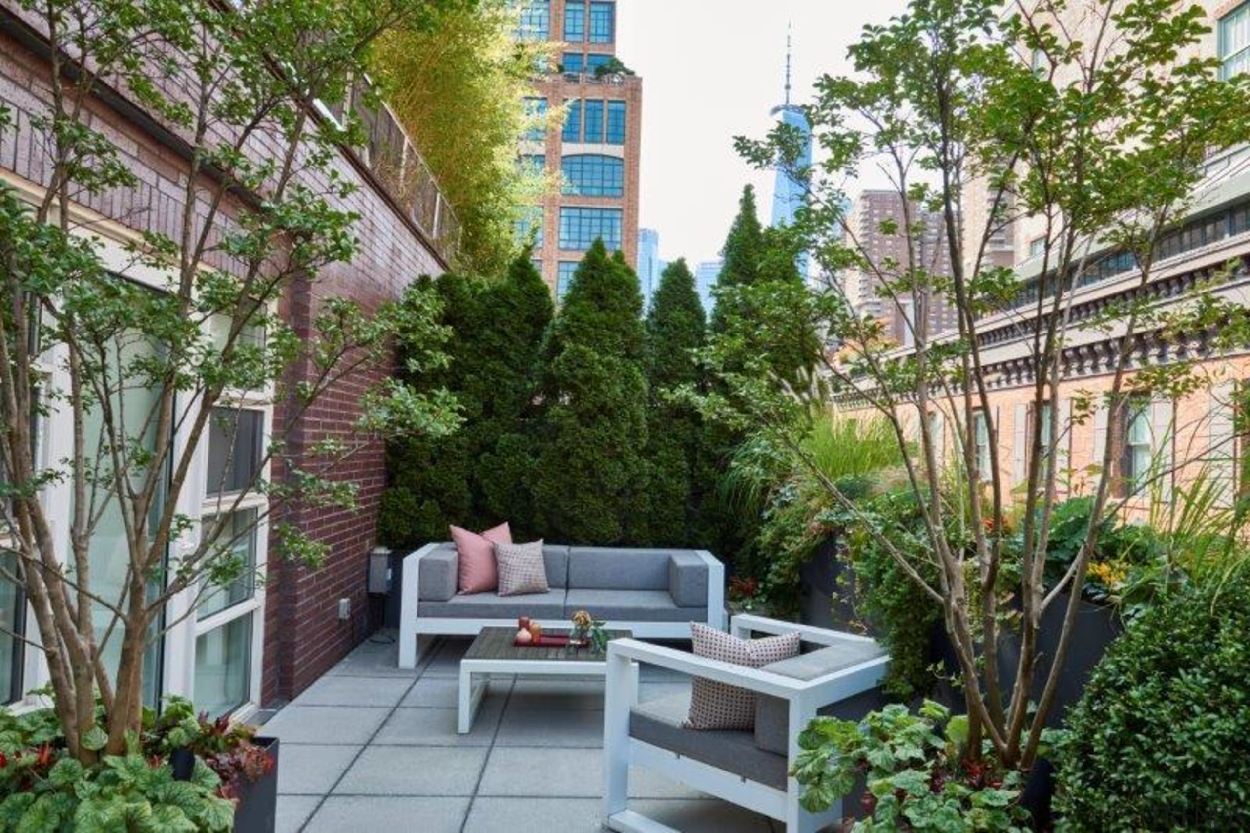 An outdoor living space extends the studio's versatility. 