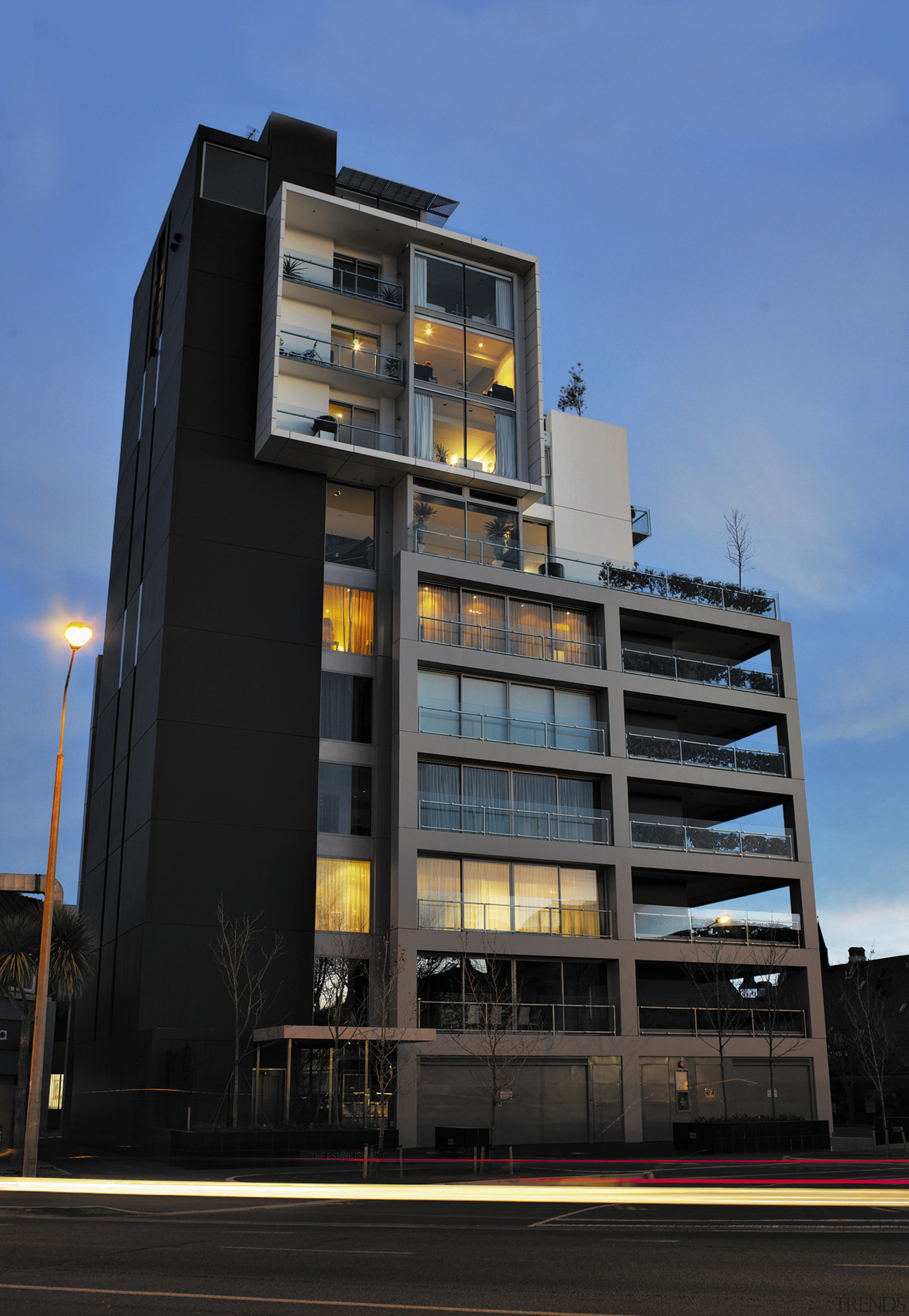 A view of a building that has Fletcher apartment, architecture, building, city, commercial building, condominium, corporate headquarters, facade, headquarters, house, metropolis, metropolitan area, mixed use, neighbourhood, real estate, residential area, sky, black, blue