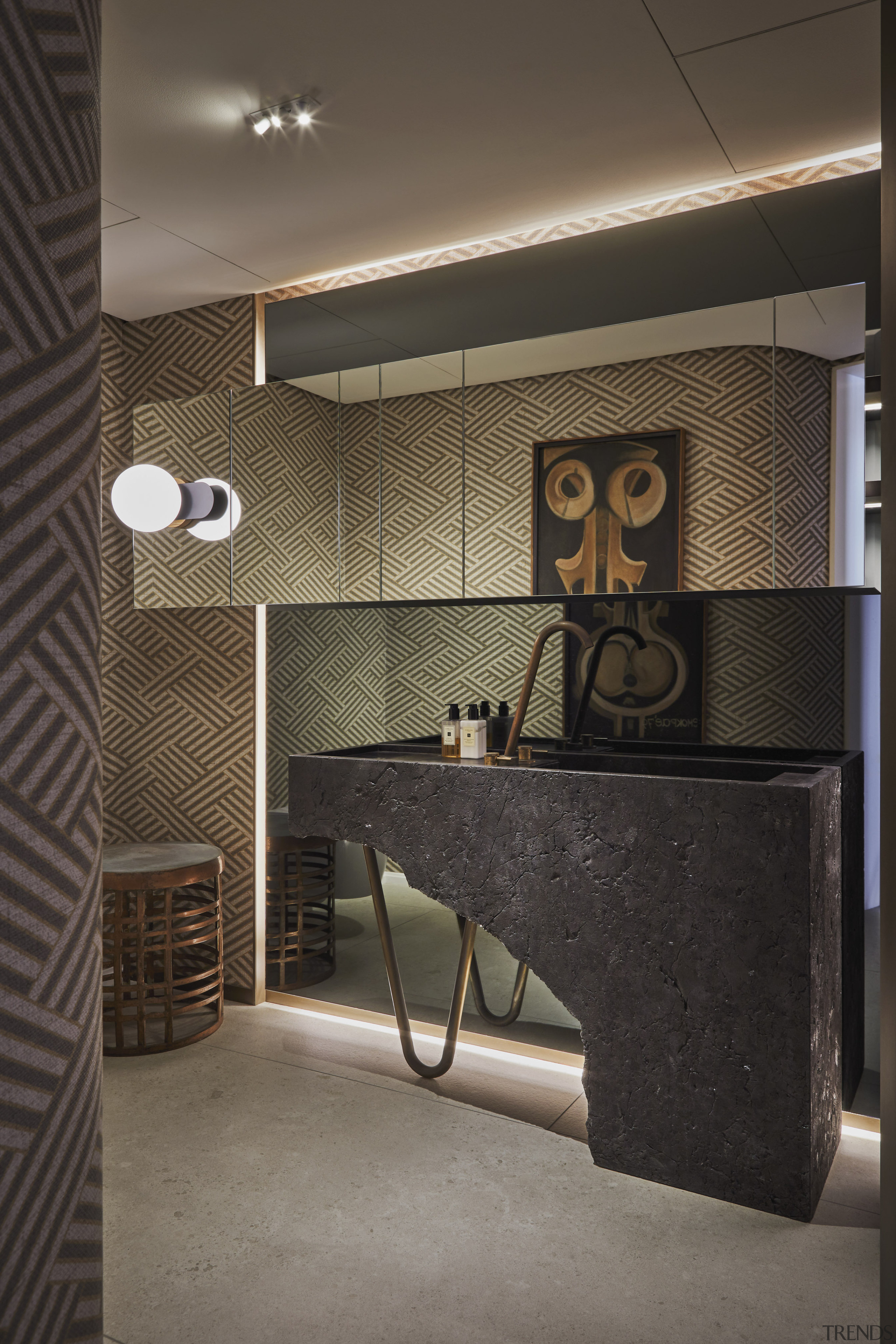 The guest bathroom featuring concealed lighting detail, complemented 