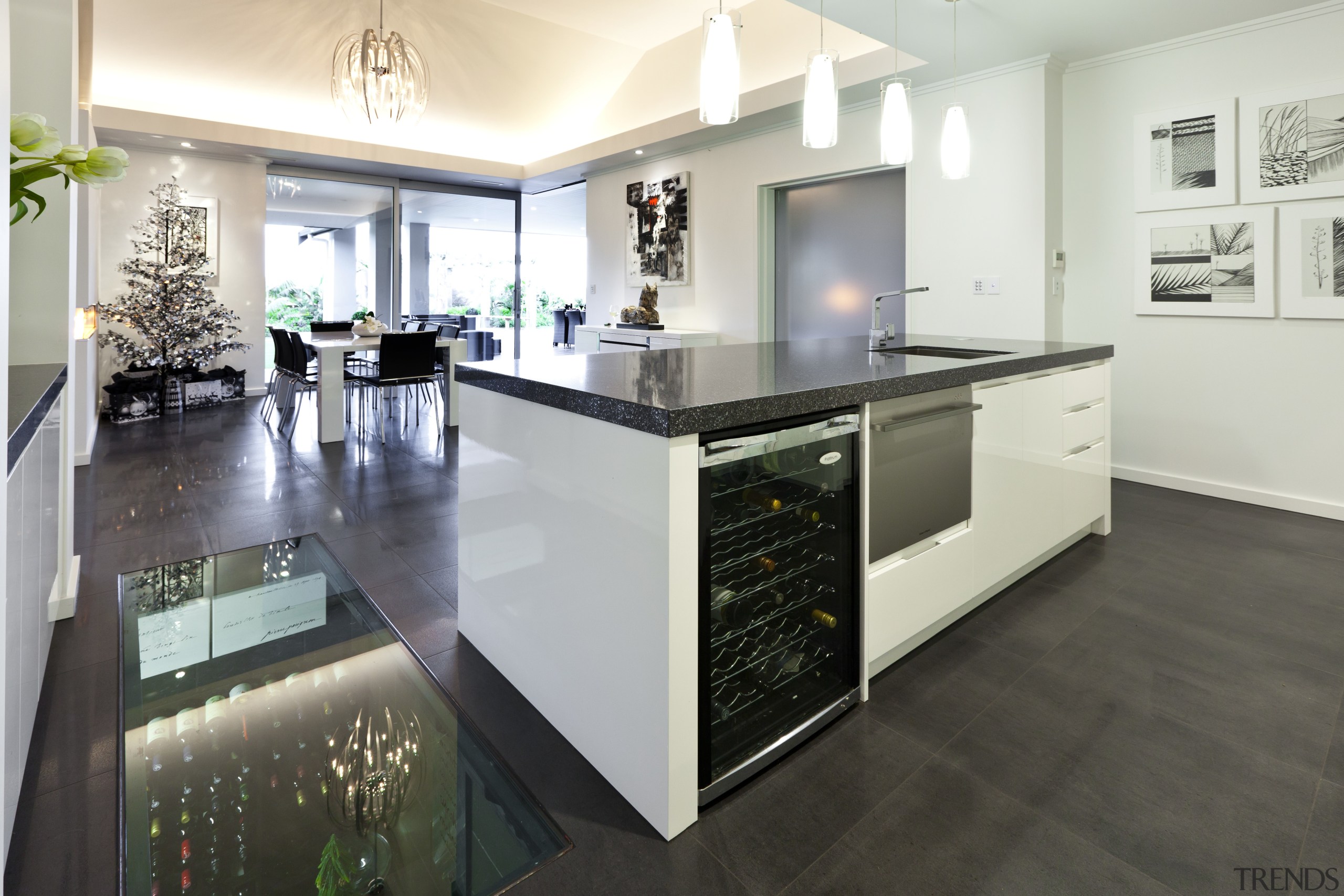 wine fridge in island, cooktop on side bench, countertop, floor, flooring, interior design, kitchen, real estate, room, white, gray