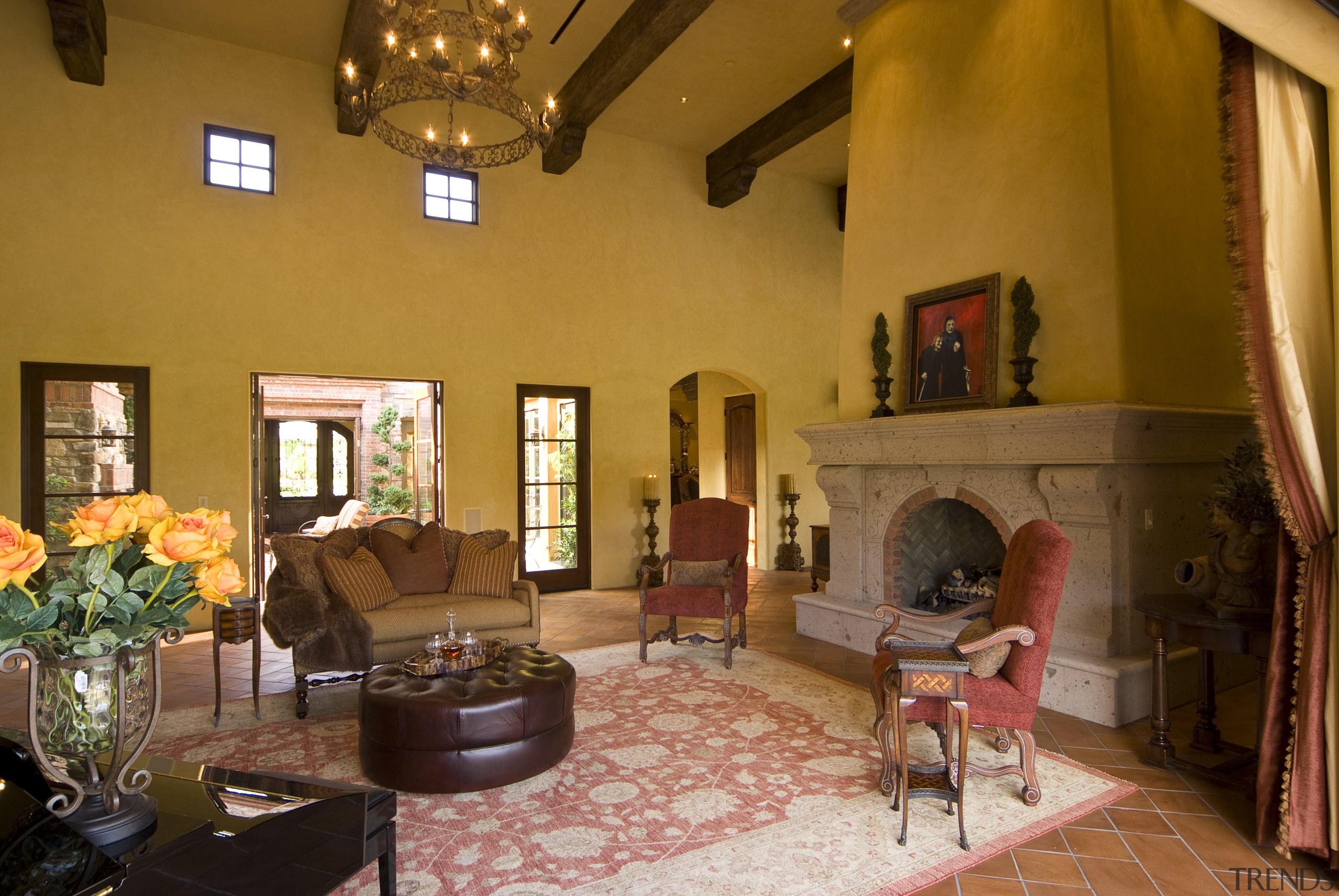 Interior view of the living area which features ceiling, estate, hacienda, home, house, interior design, living room, property, real estate, room, brown, orange