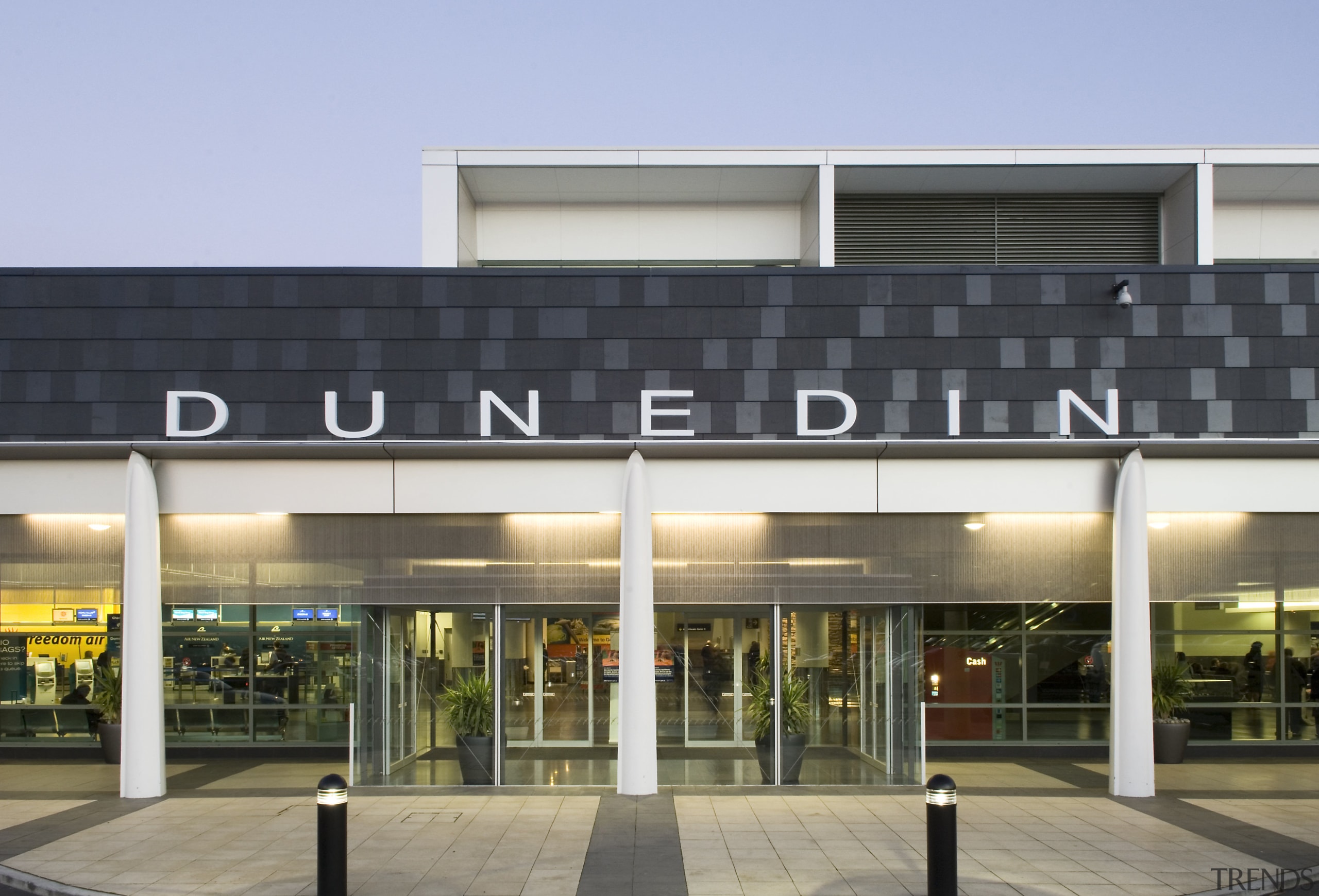 Dunedin's new International Airport is a light-fitted, modern building, commercial building, condominium, corporate headquarters, facade, mixed use, real estate, gray