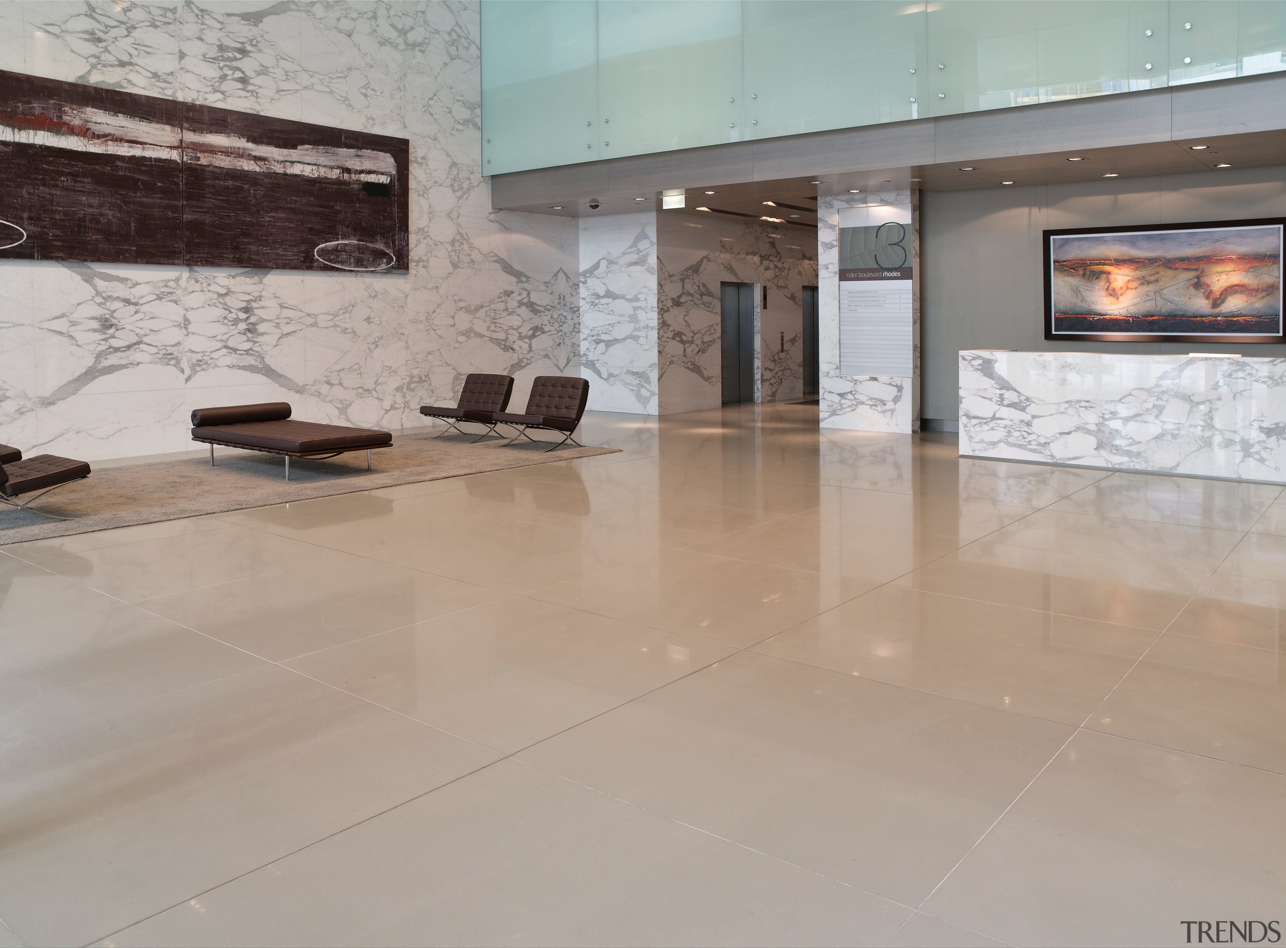 Large office foyer with natural marble cladding and floor, flooring, interior design, lobby, property, tile, wood flooring, gray