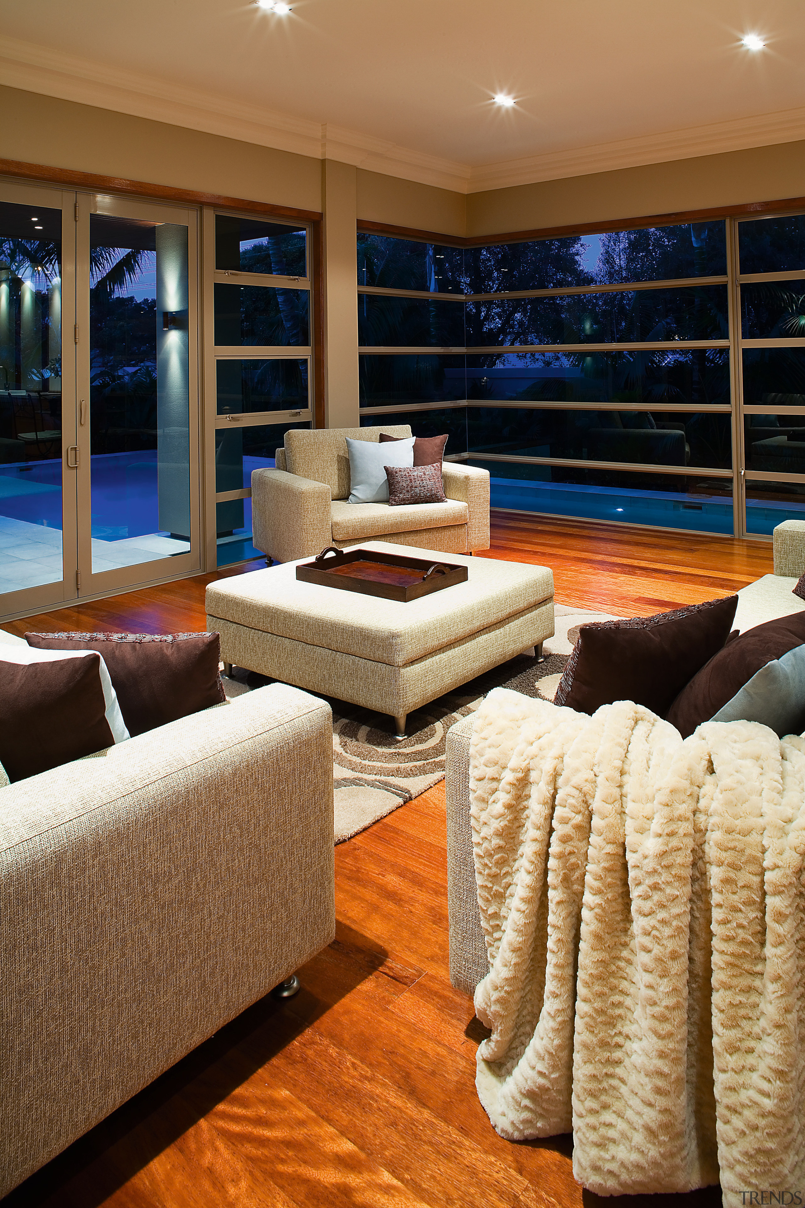 Lounge suite with brown cushions , textured throw, ceiling, floor, flooring, interior design, living room, room, wood, brown