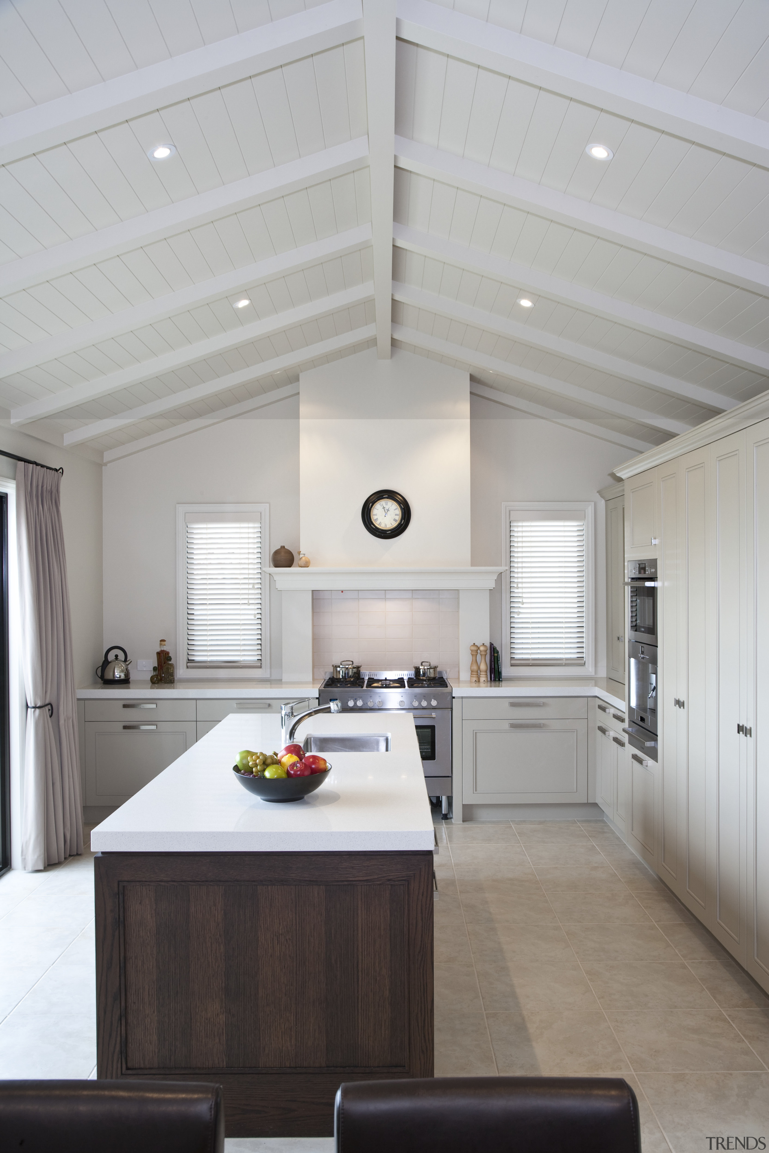 View of kitchen and dining area featuring floor-to-ceiling architecture, ceiling, countertop, daylighting, floor, home, house, interior design, kitchen, living room, real estate, room, gray