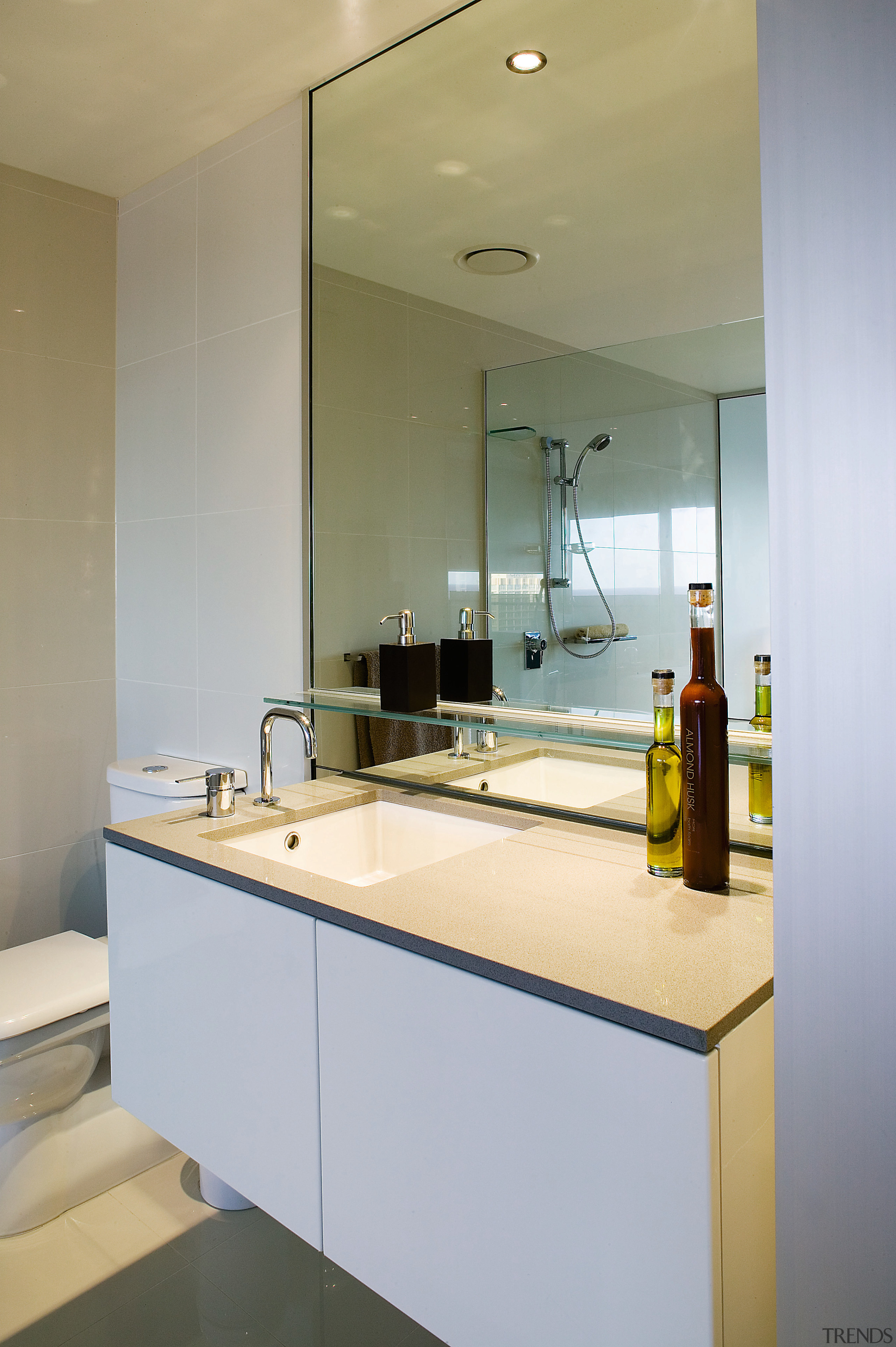 A view of the bathroom featuring  frameless architecture, bathroom, countertop, interior design, kitchen, product design, real estate, room, sink, gray