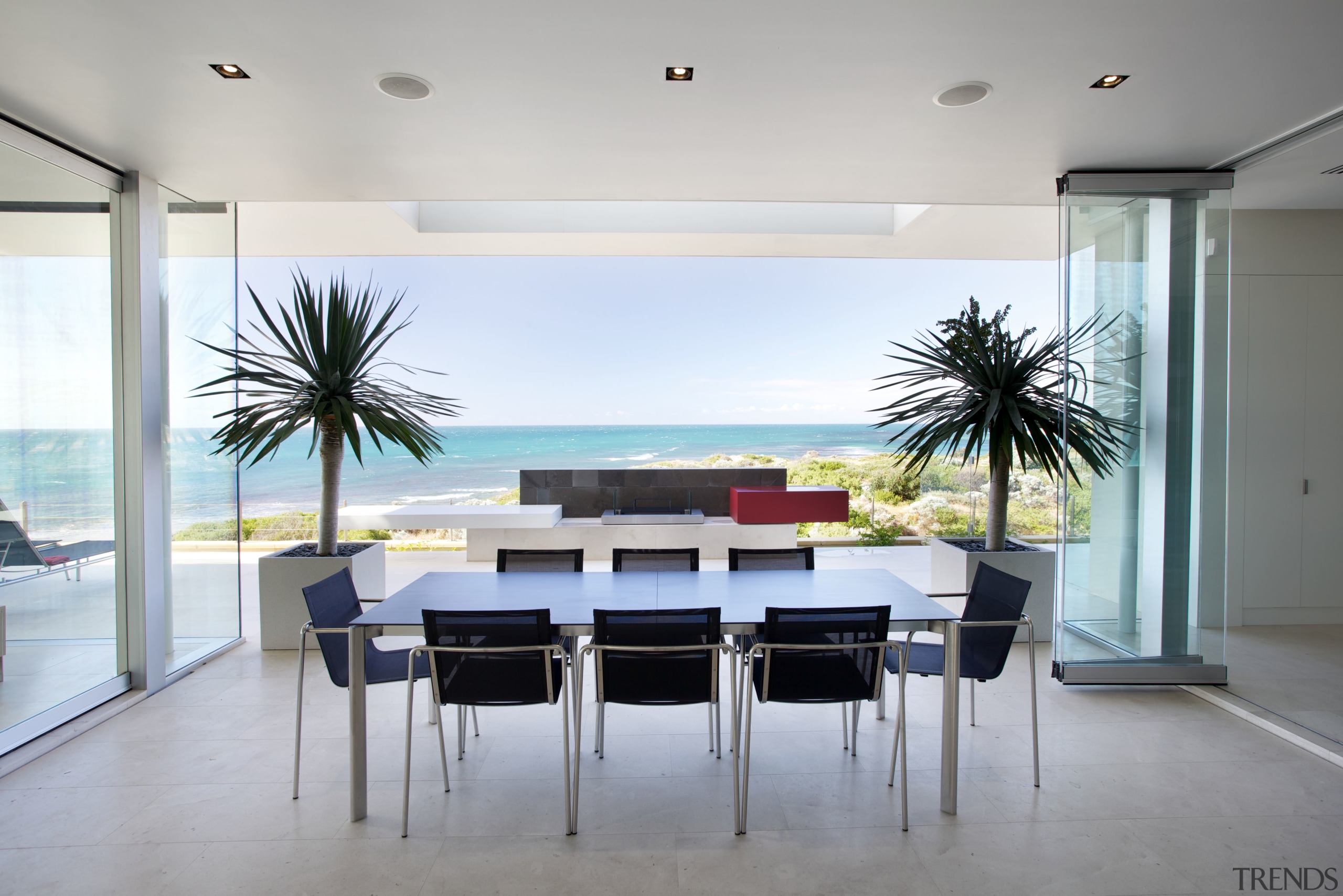 Even in blustery conditions, this inset terrace provides apartment, architecture, chair, furniture, house, interior design, living room, real estate, table, window, gray