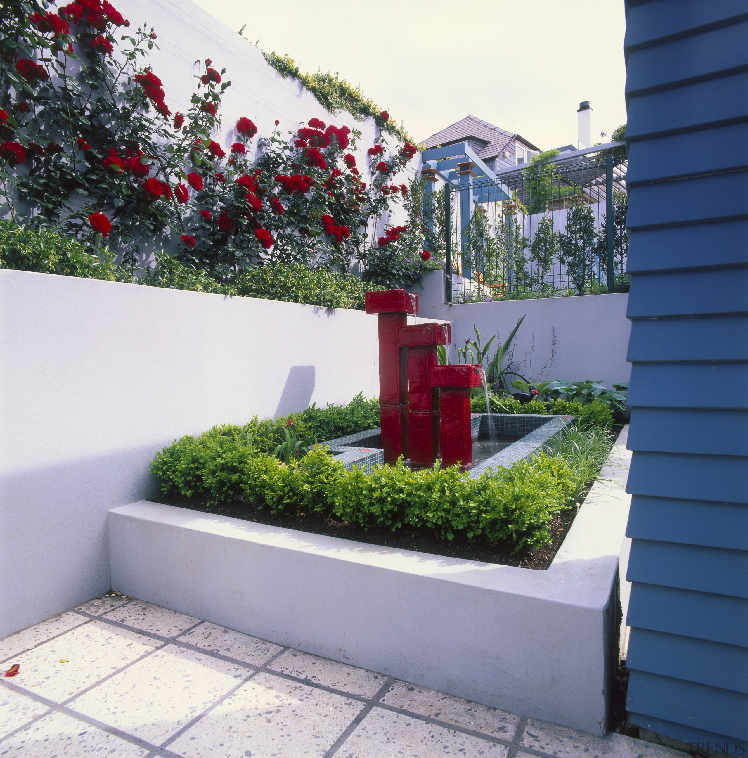 An exterior view of the garden area, plants, courtyard, flower, flowerpot, garden, home, house, plant, property, real estate, wall