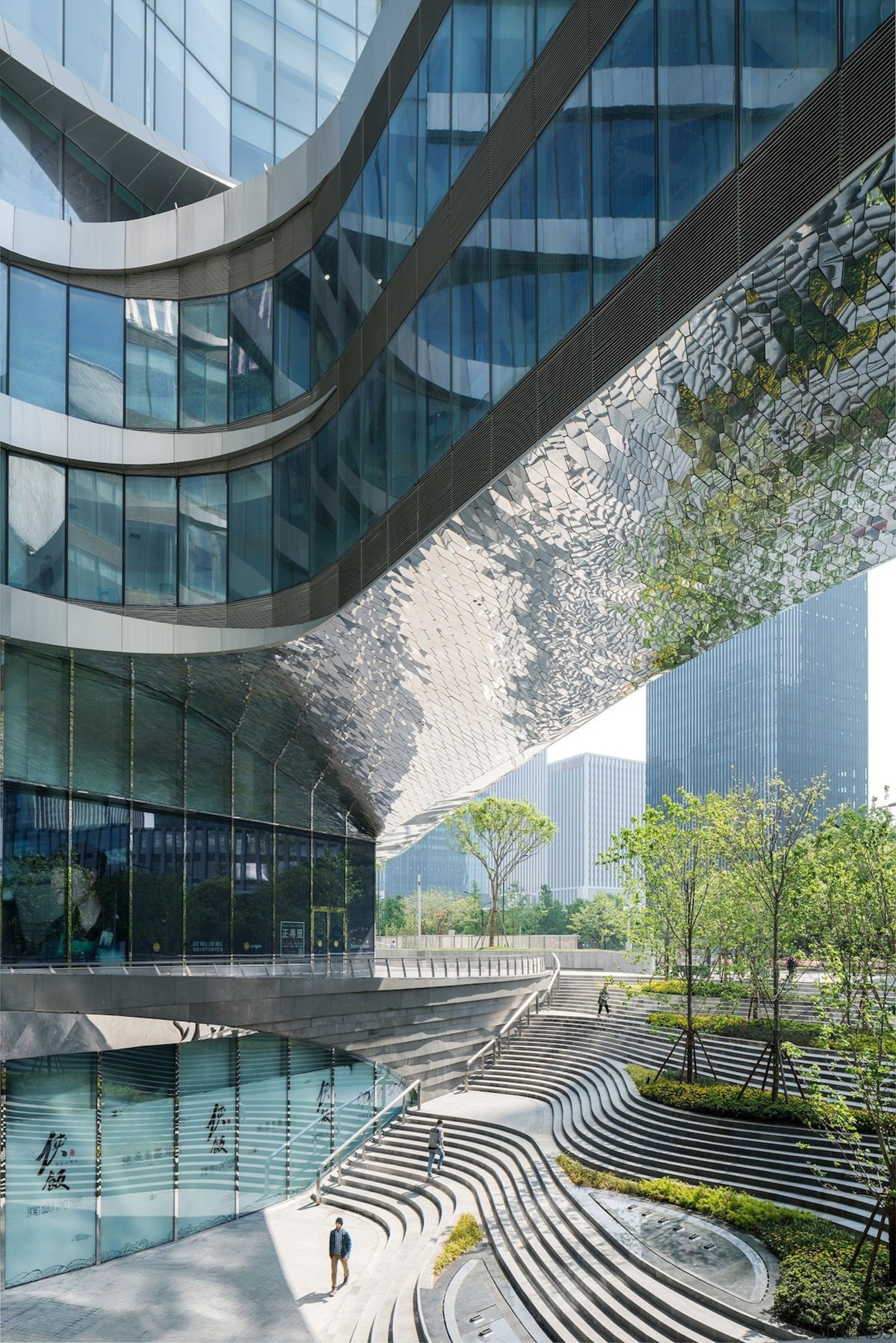 Raffles City Hangzhou – UNStudio - Raffles City architecture, building, commercial building, condominium, corporate headquarters, daylighting, daytime, facade, headquarters, metropolis, metropolitan area, mixed use, reflection, urban design, gray, black