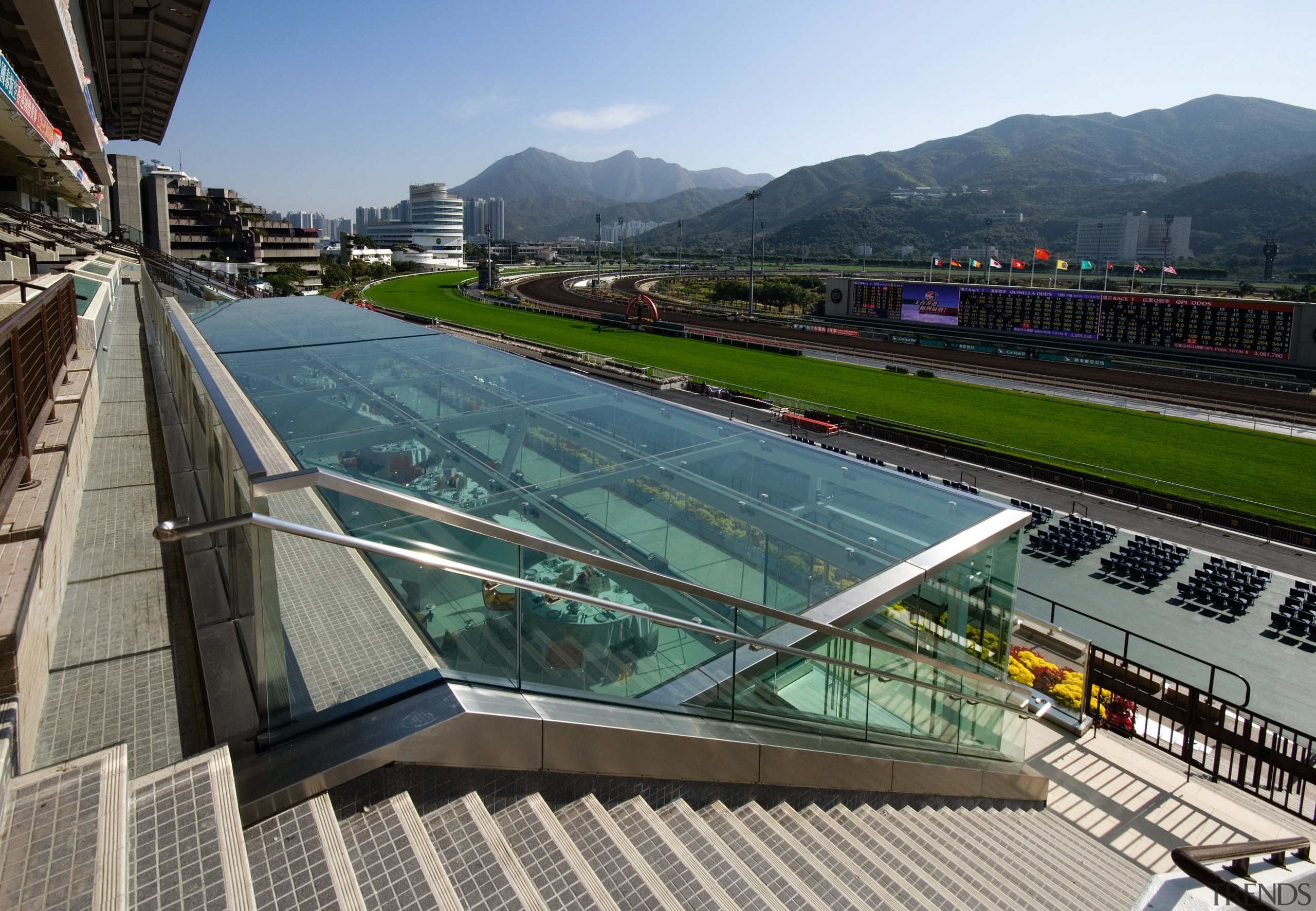 An exterior view of the function centre. - architecture, building, city, metropolitan area, roof, sky, structure, urban area, gray, black, teal