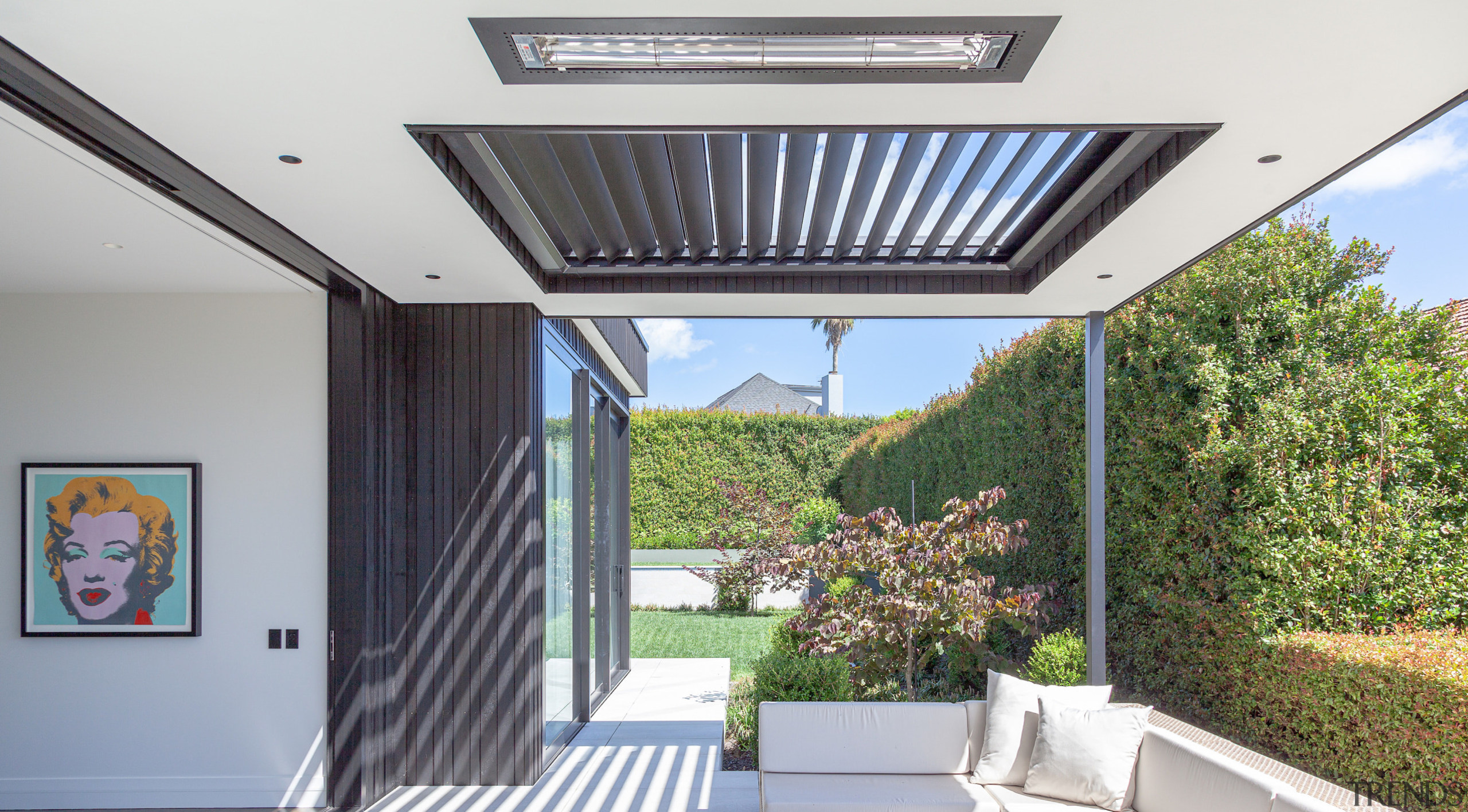 Operable louvres and a heater provide in-ceiling environment 