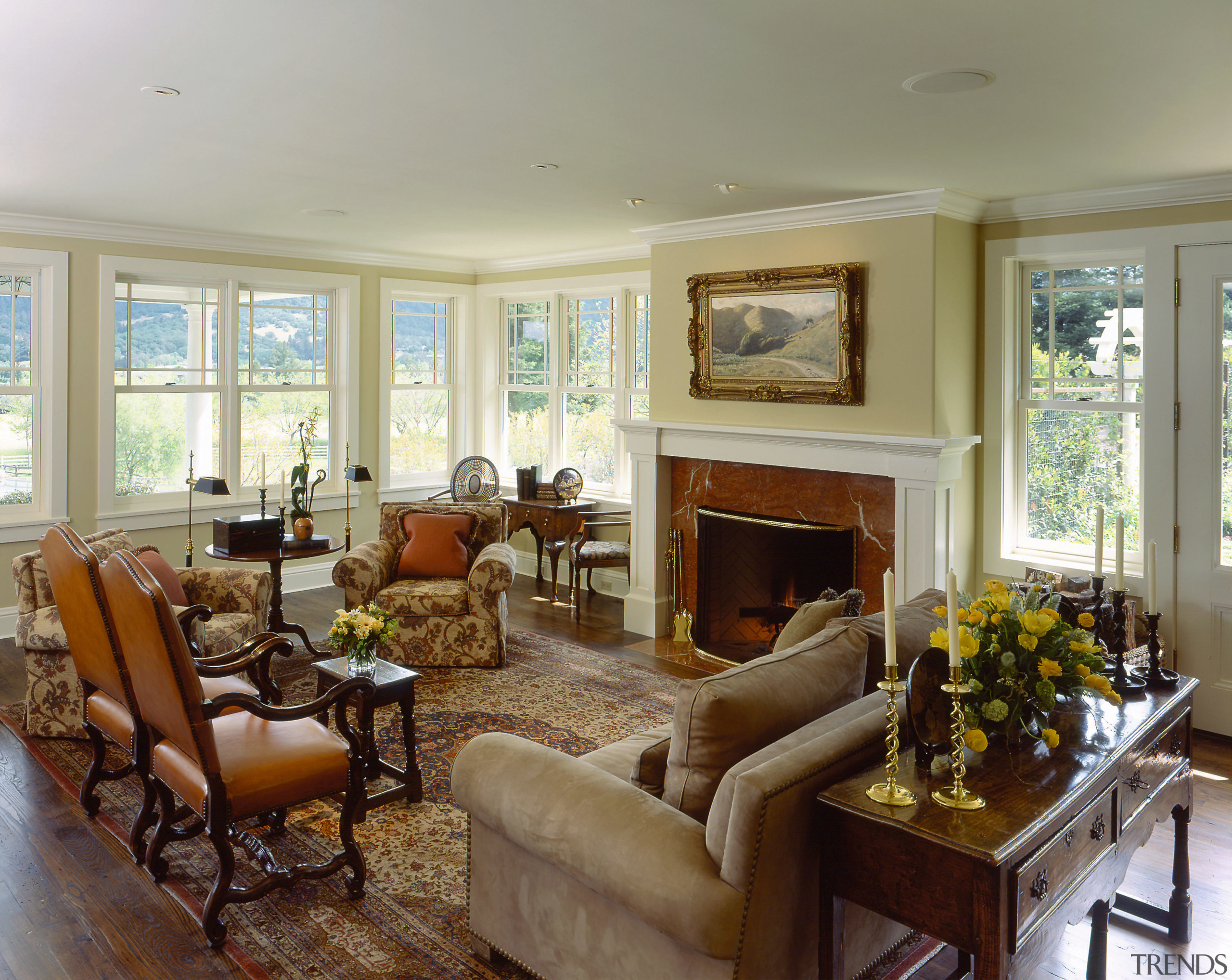 An interior view of the living space featuring ceiling, estate, home, house, interior design, living room, property, real estate, room, window, gray, brown