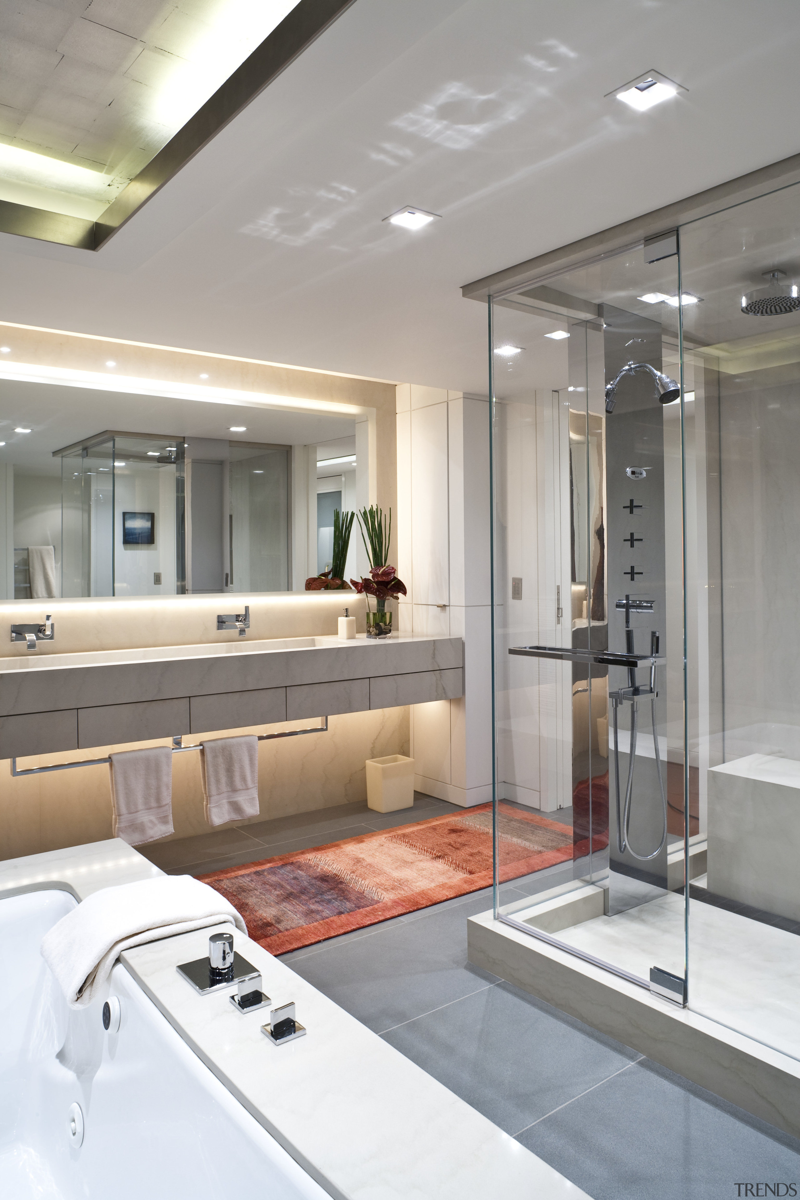 View of master bathroom featuring limestone vanity, recessed bathroom, floor, interior design, gray