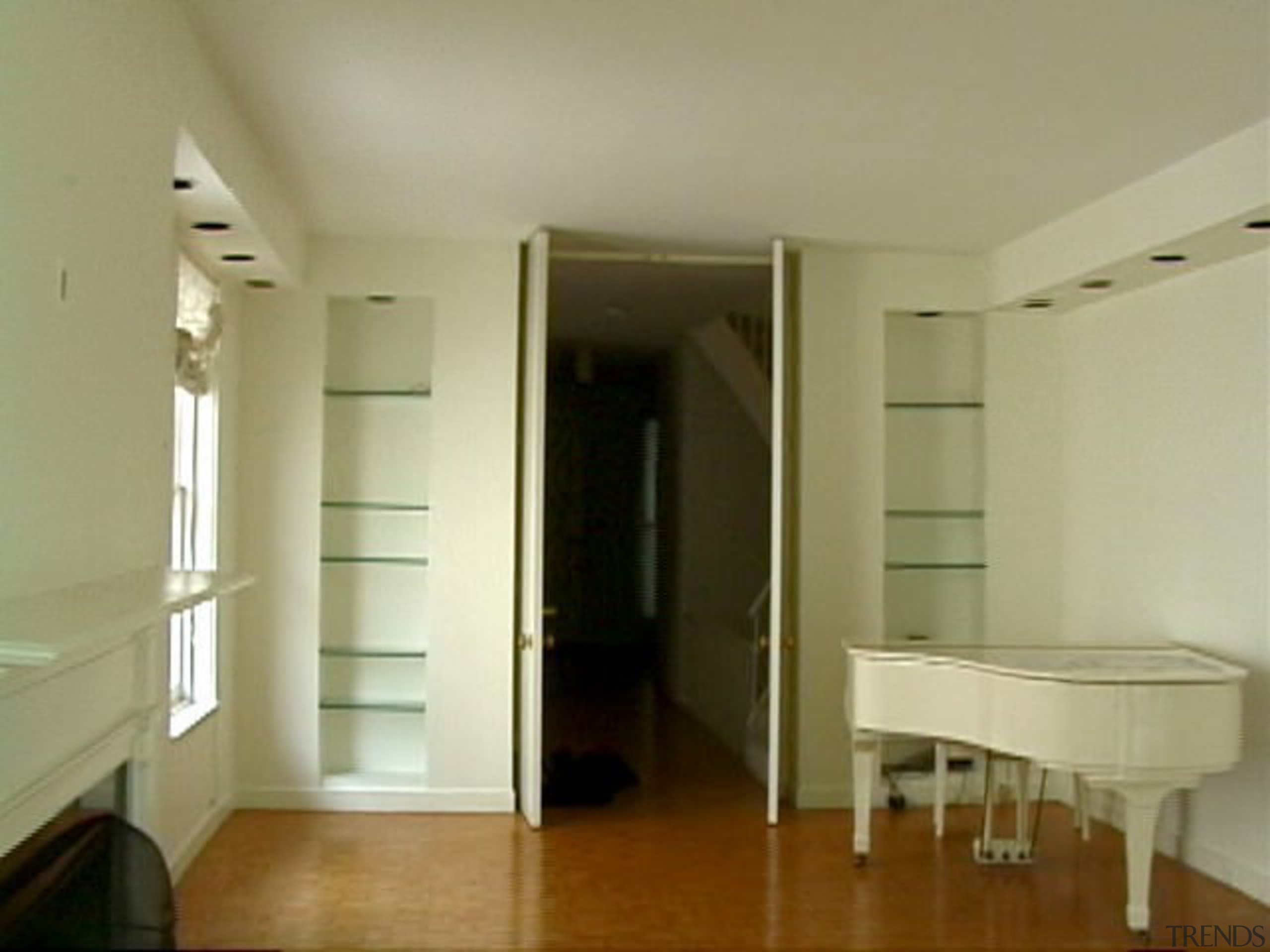 Florain has installed a glass floor panel, the apartment, ceiling, door, floor, flooring, hardwood, home, interior design, property, real estate, room, wall, window, wood flooring, orange, brown