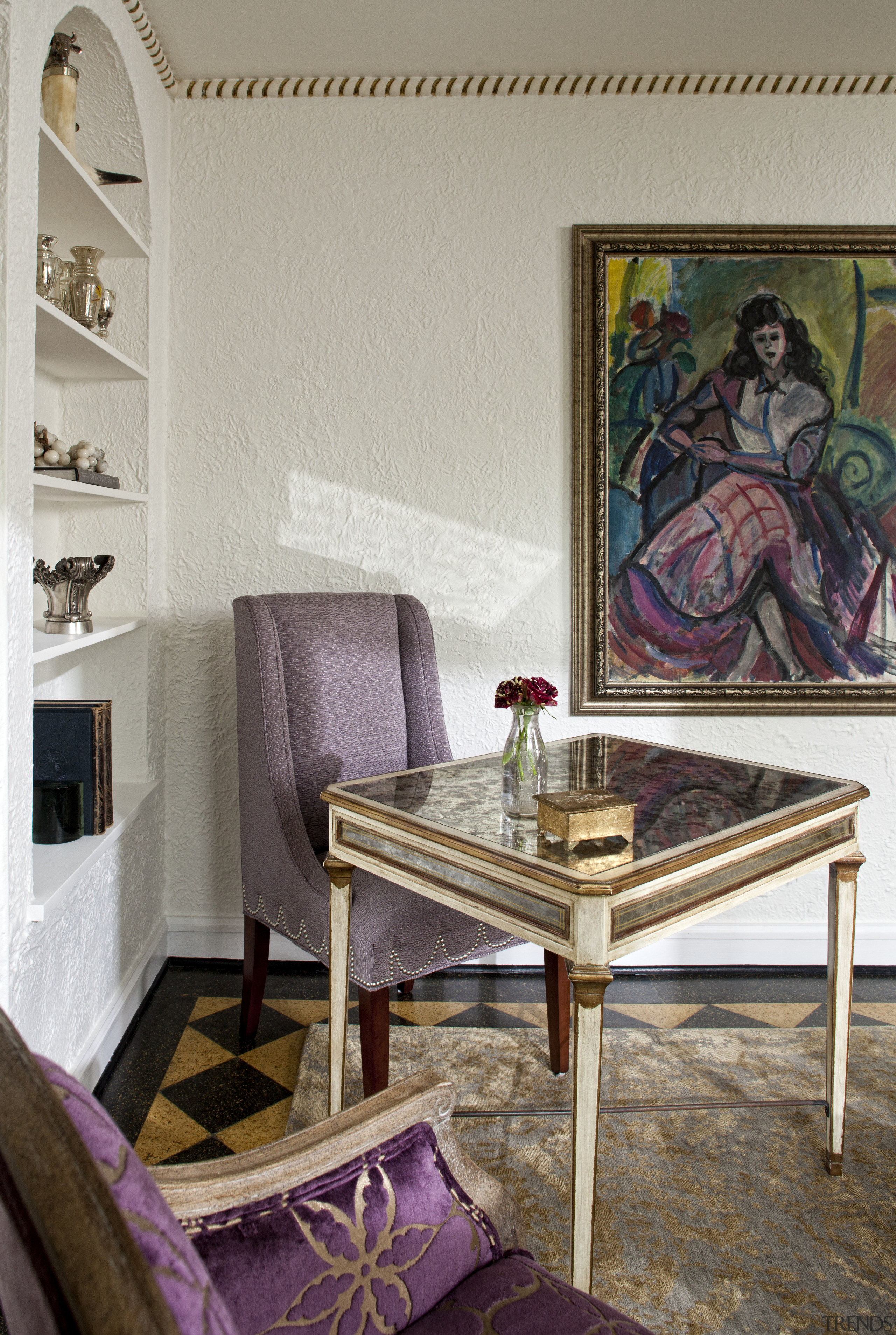 Seen here is a home that's interior was chair, furniture, home, interior design, living room, purple, room, table, wall, gray