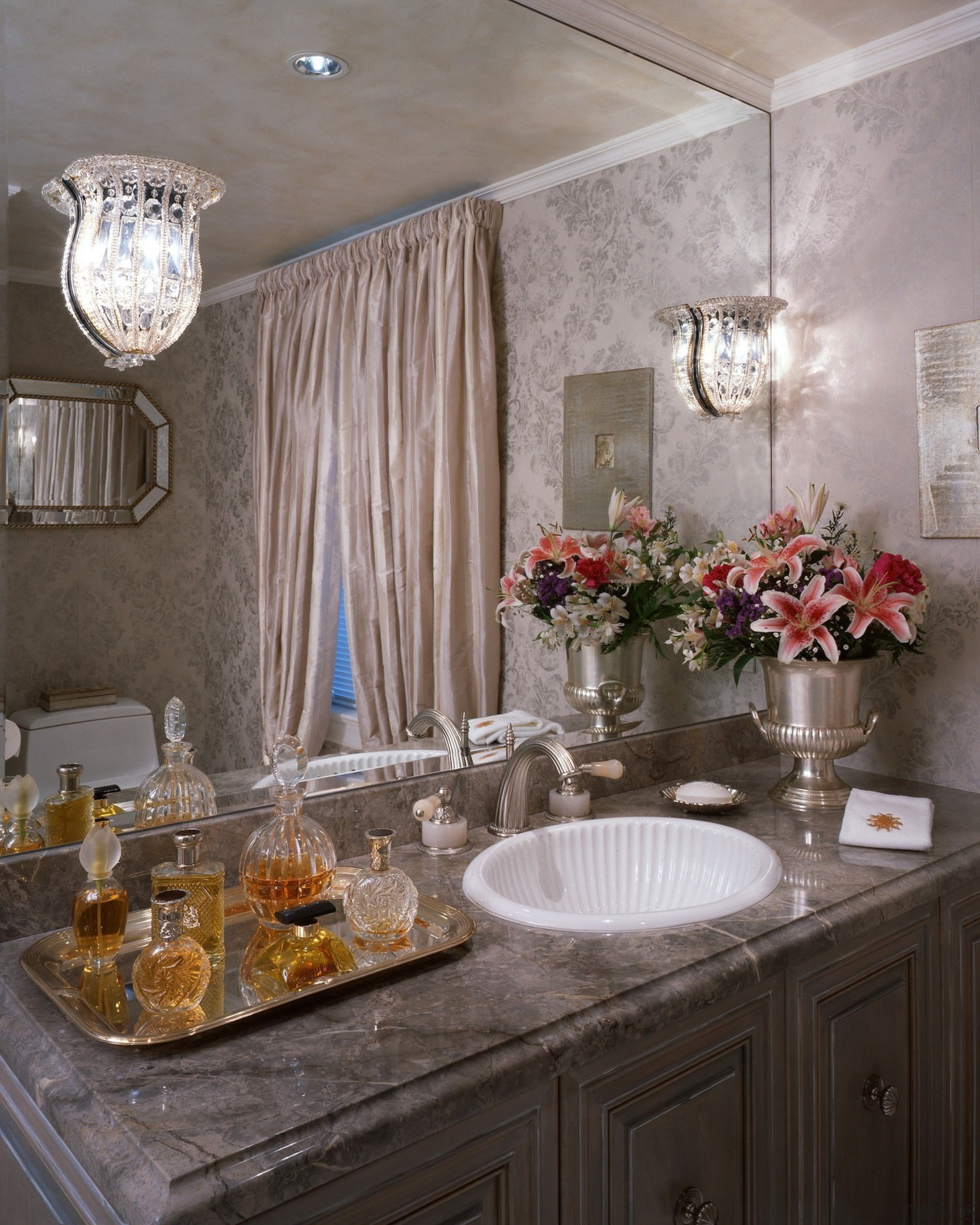 An expansive mirror certainly makes the room feel bathroom, ceiling, countertop, dining room, home, interior design, kitchen, room, sink, gray