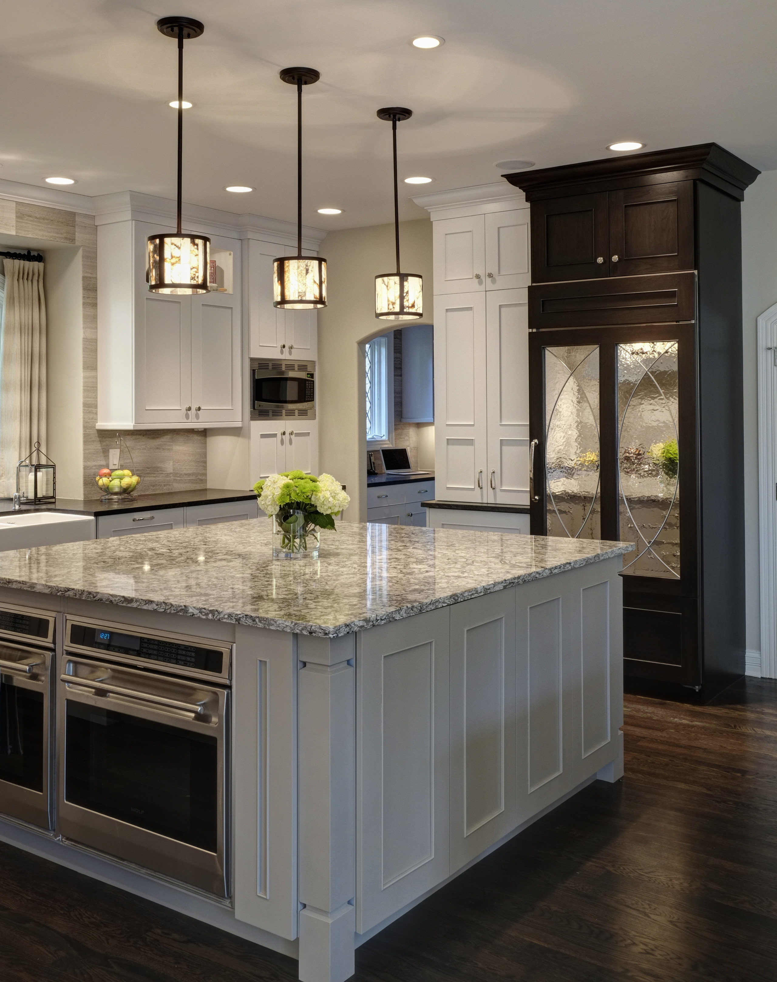 This kitchen design provides ample storage, including two cabinetry, countertop, cuisine classique, floor, flooring, hardwood, interior design, kitchen, room, wood flooring, gray, black